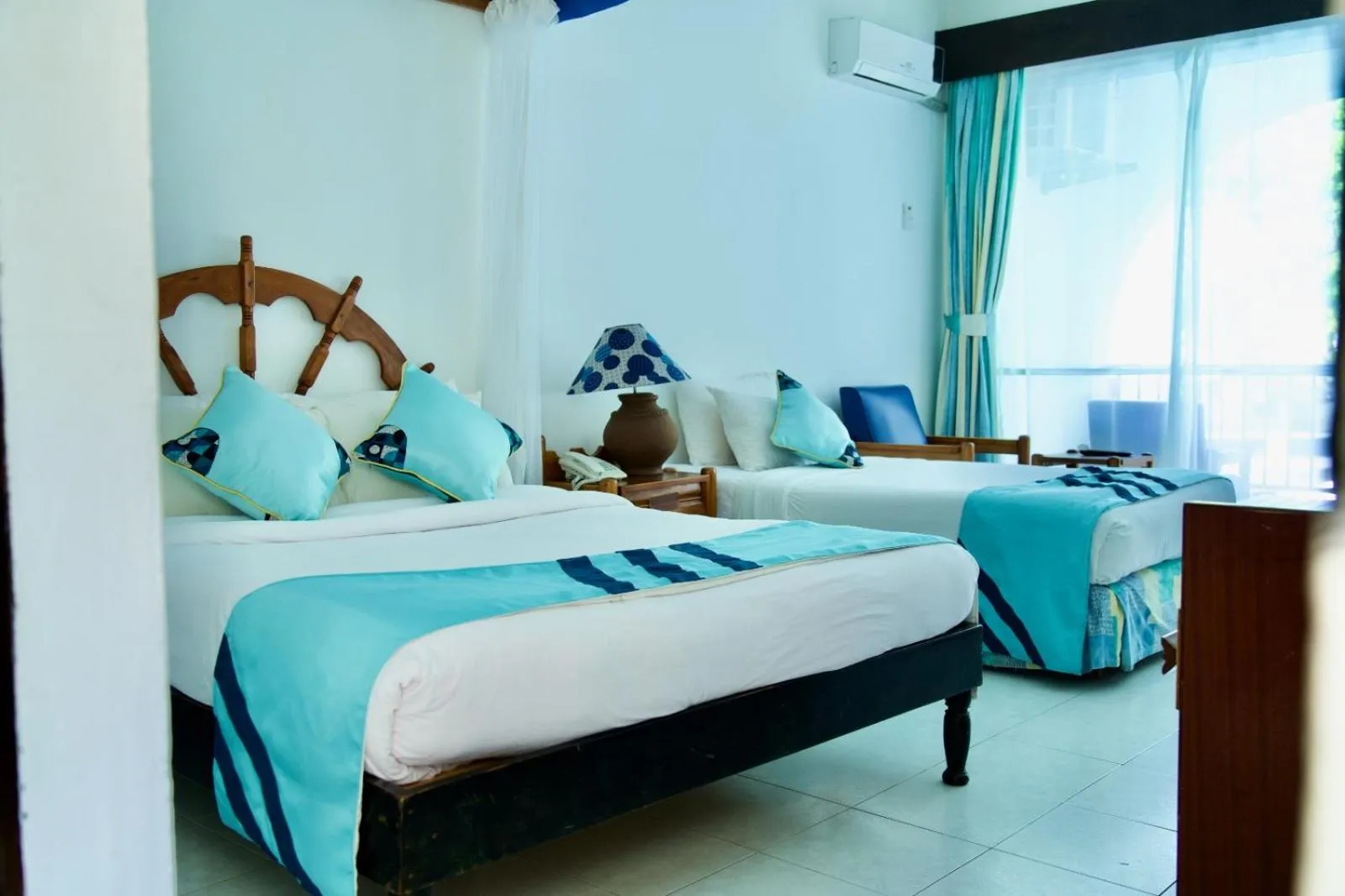 Bed in Plaza Beach Hotel