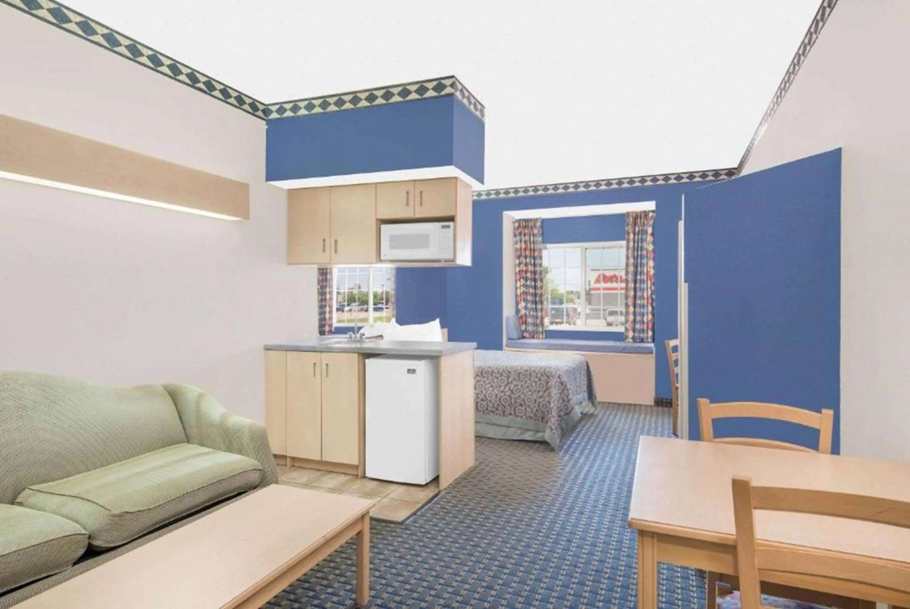 Photo of the whole room, Bed in Days Inn & Suites by Wyndham Hutchinson