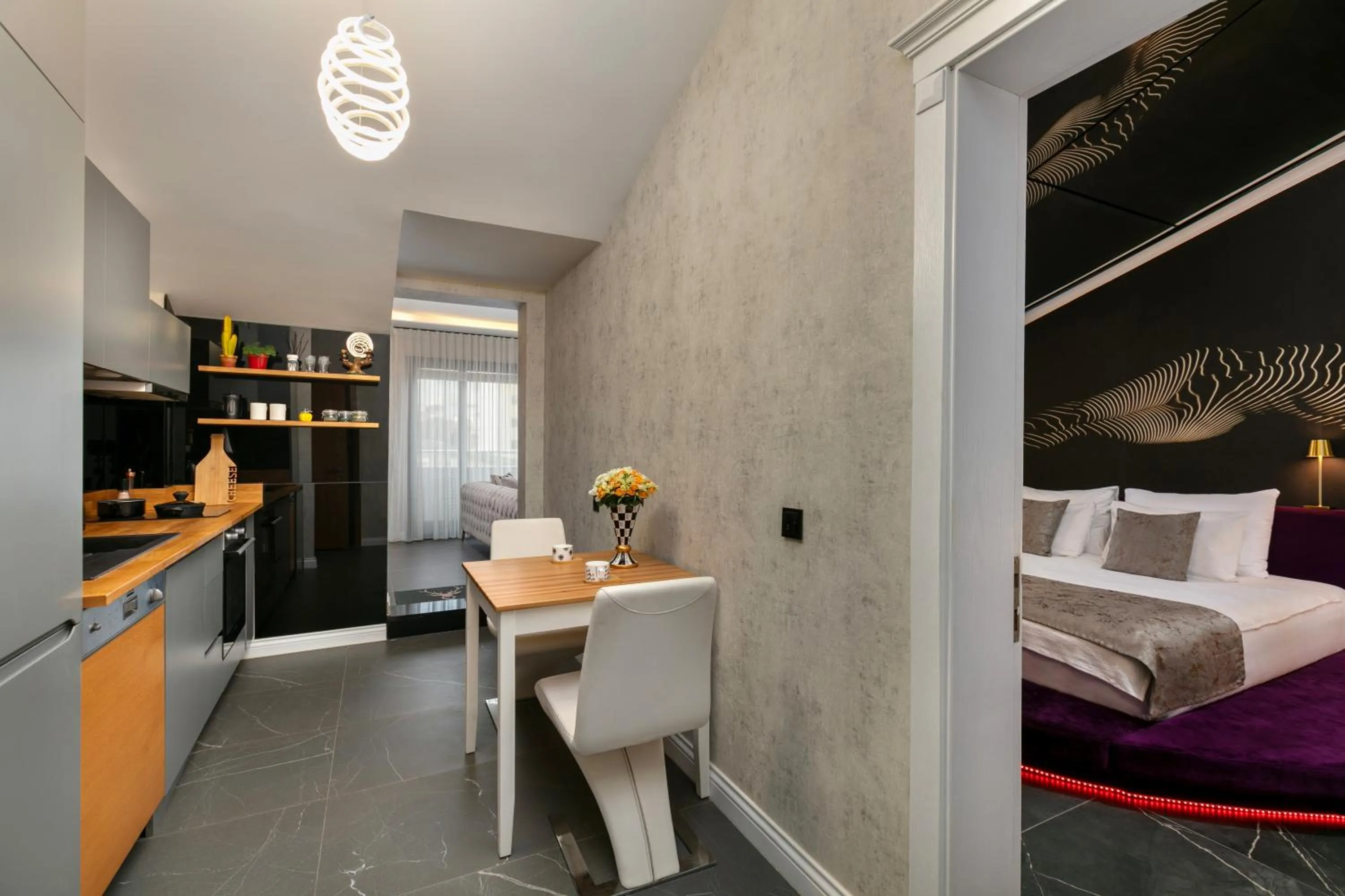 Dining area, Bed in Wolf Suites