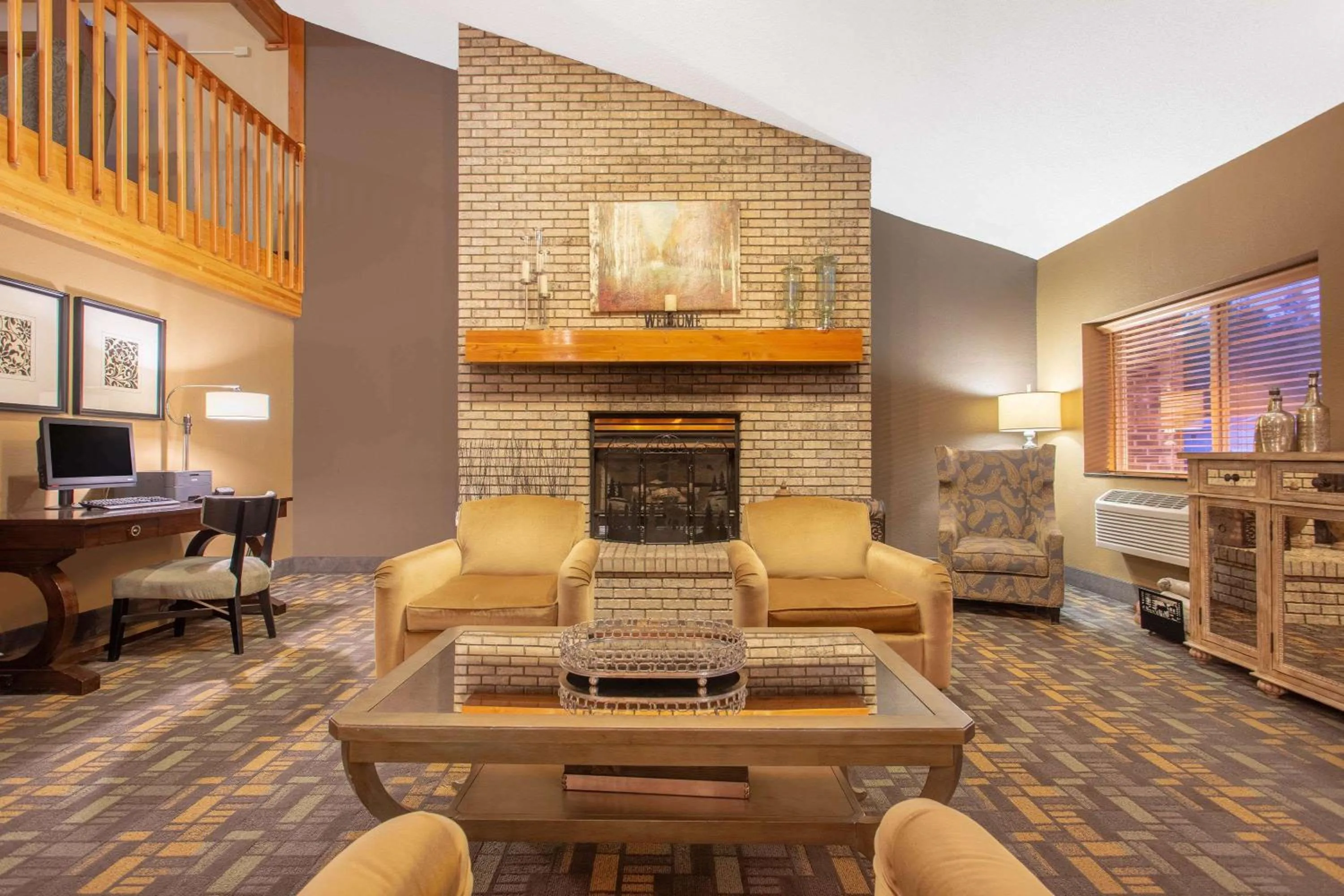 Lobby or reception in AmericInn by Wyndham Rhinelander