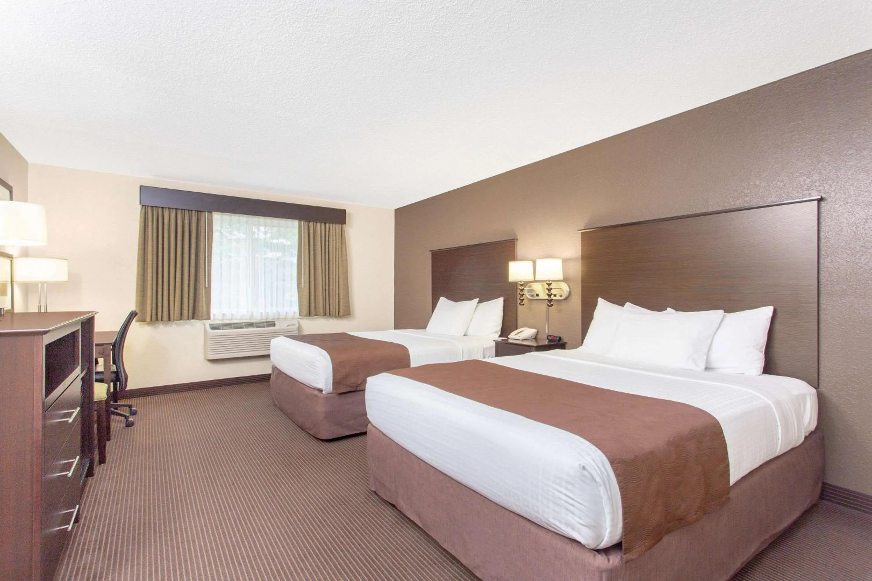 Photo of the whole room, Bed in AmericInn by Wyndham Rhinelander