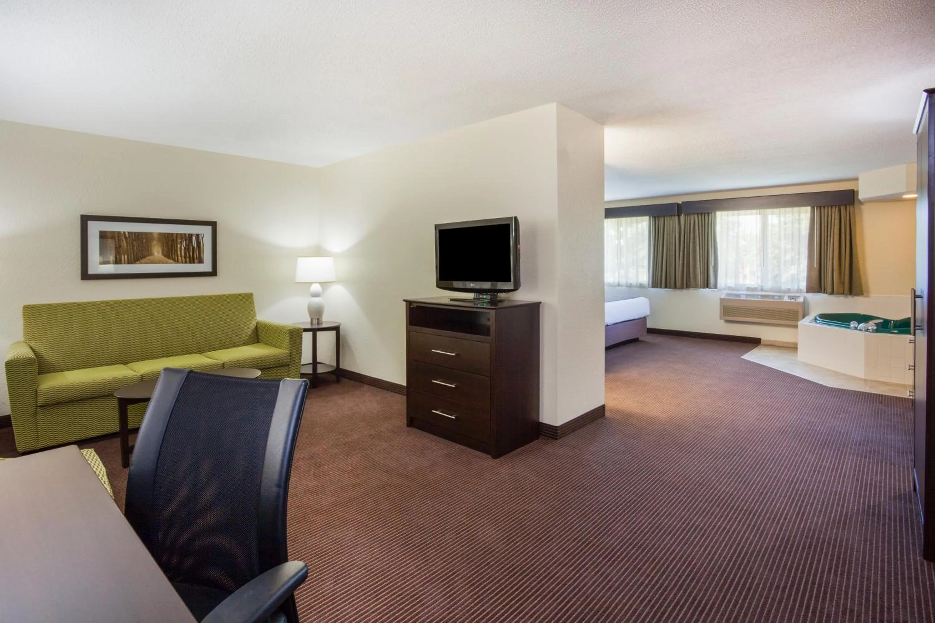Photo of the whole room, Bed in AmericInn by Wyndham Rhinelander