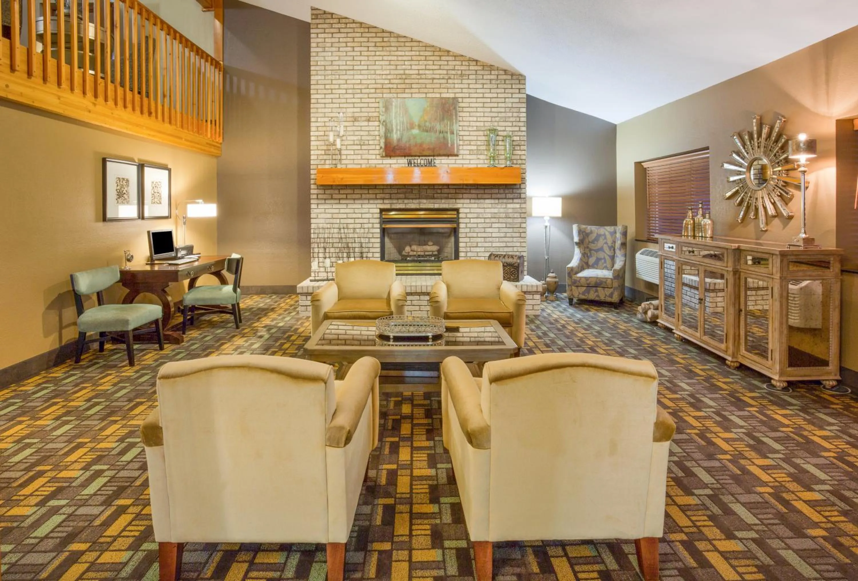 Lobby or reception in AmericInn by Wyndham Rhinelander
