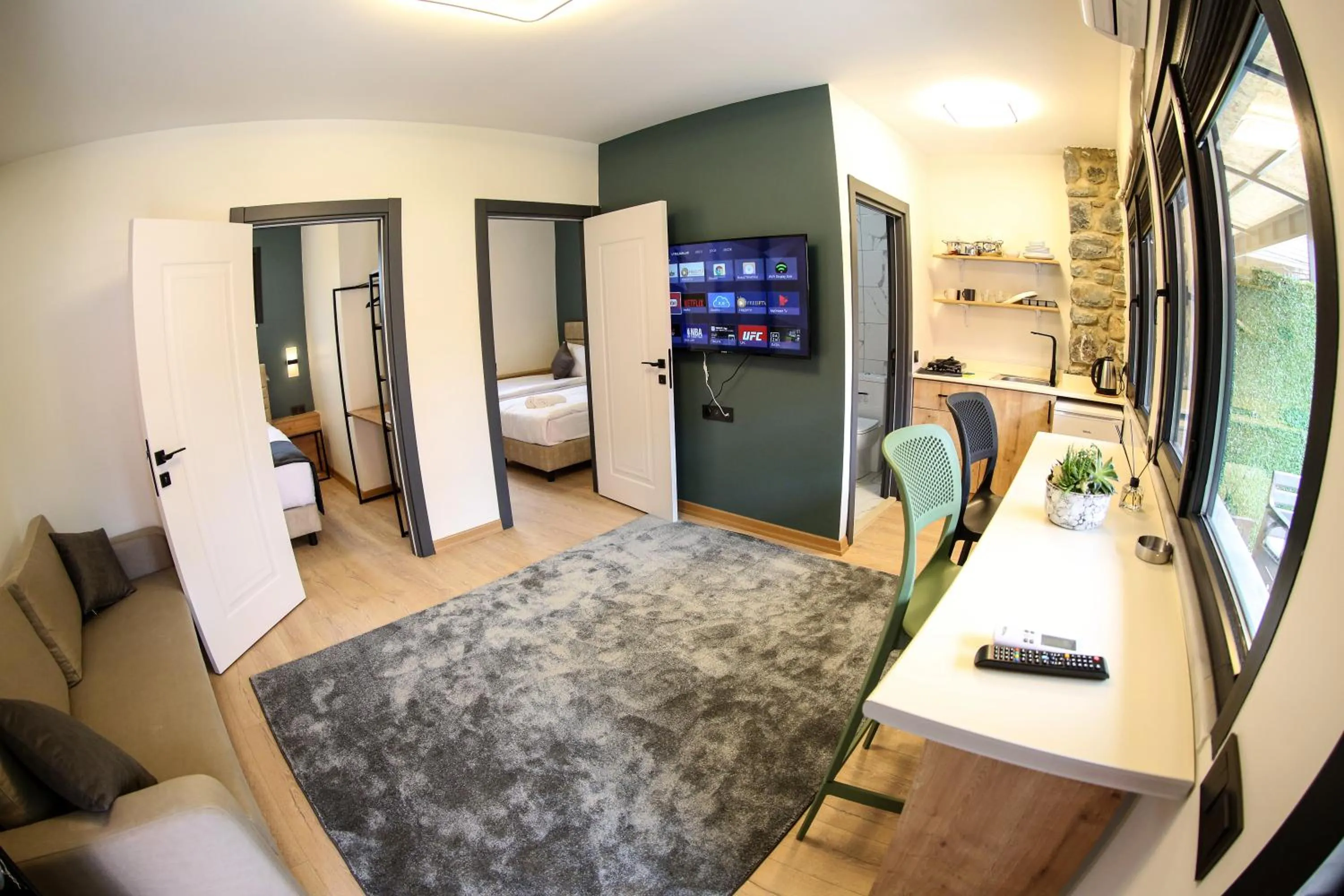 Kitchen or kitchenette, Bed in Mia Mia Suites