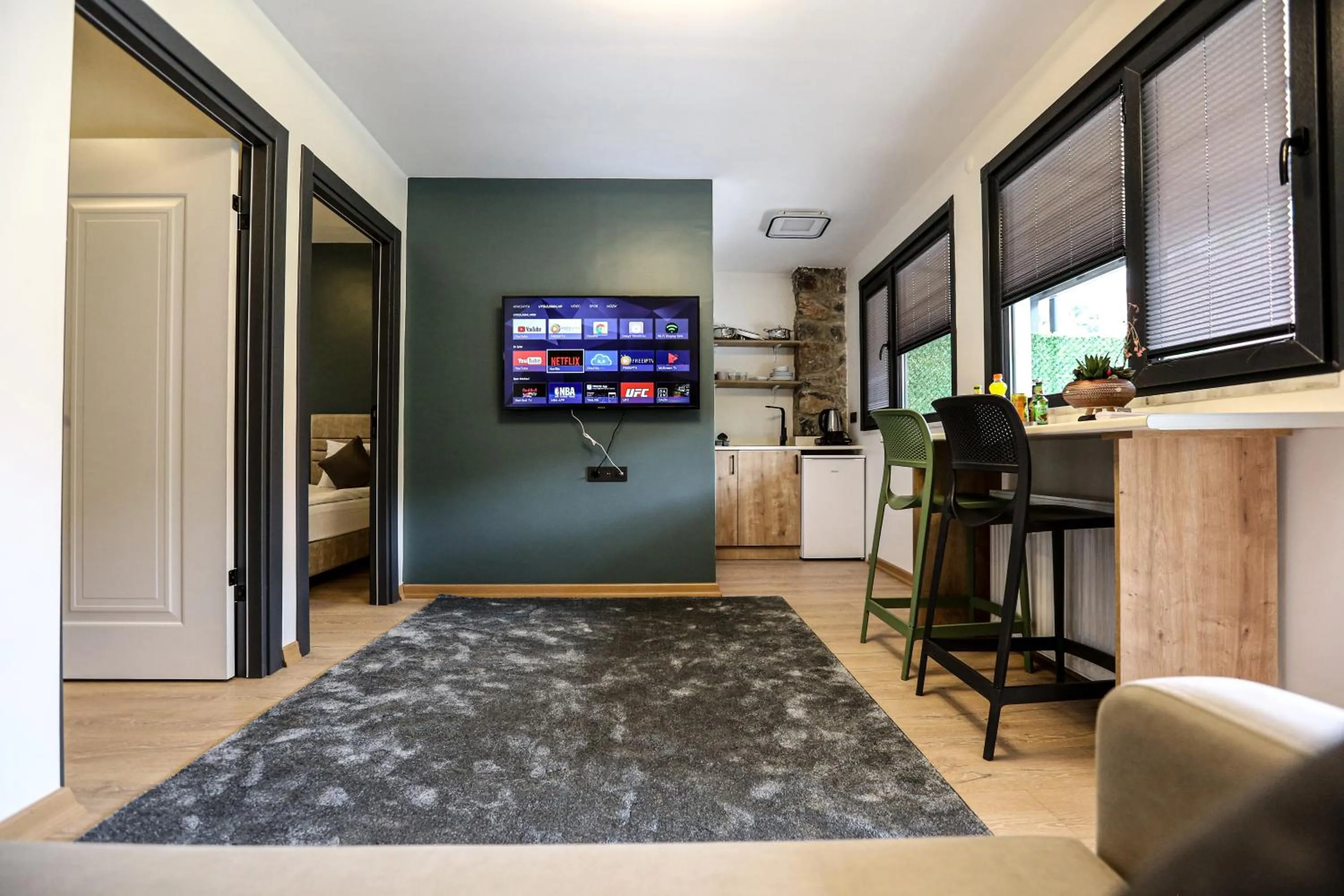 Kitchen or kitchenette, Bed in Mia Mia Suites