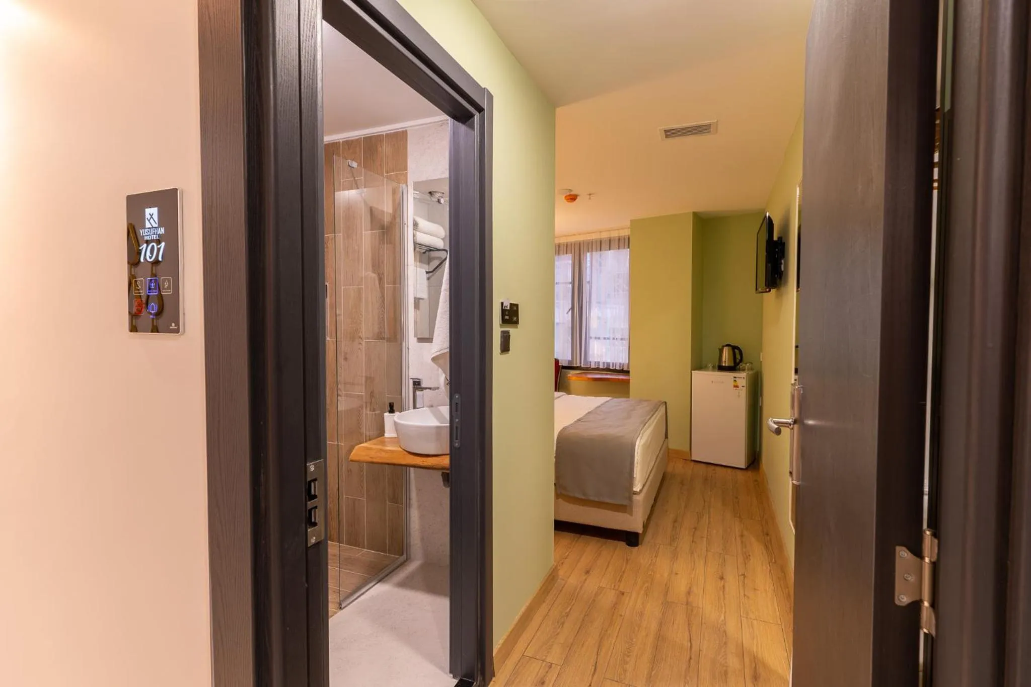 Bed in Yusufhan Suites