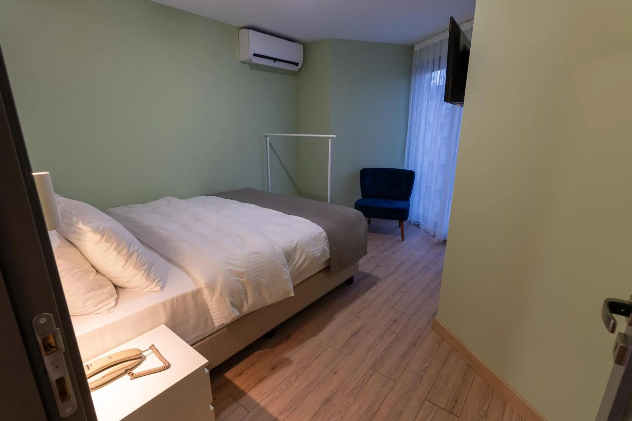 Bed in Yusufhan Suites