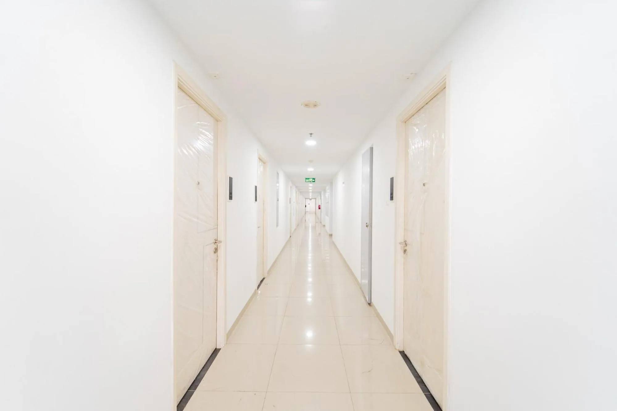 Property building in RedLiving Apartemen Patra Land Urbano - Happy Rooms Tower Mid-West with Netflix