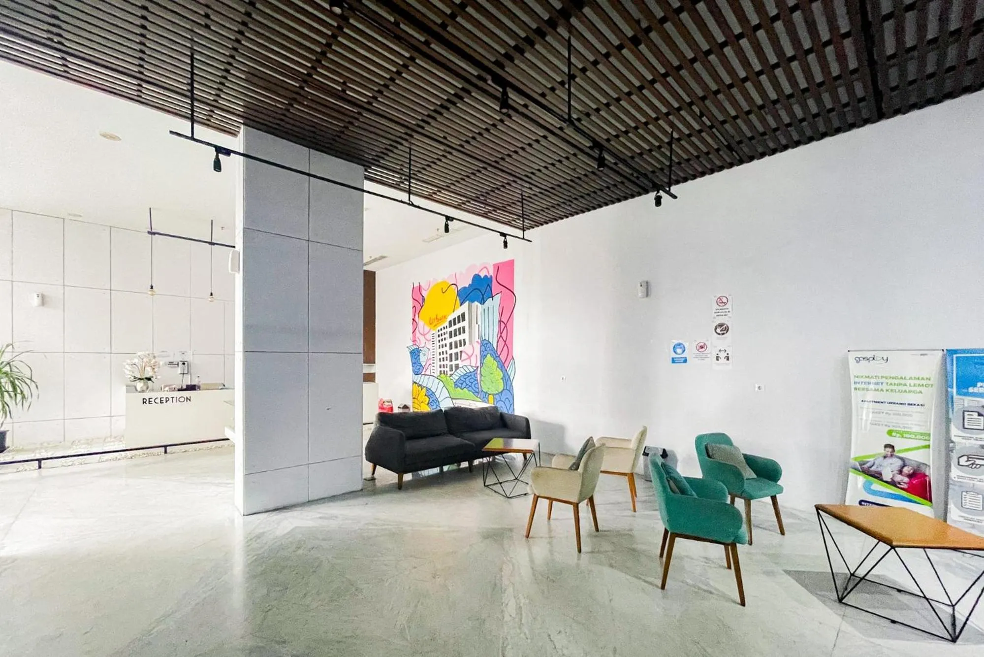 Property building in RedLiving Apartemen Patra Land Urbano - Happy Rooms Tower Mid-West with Netflix