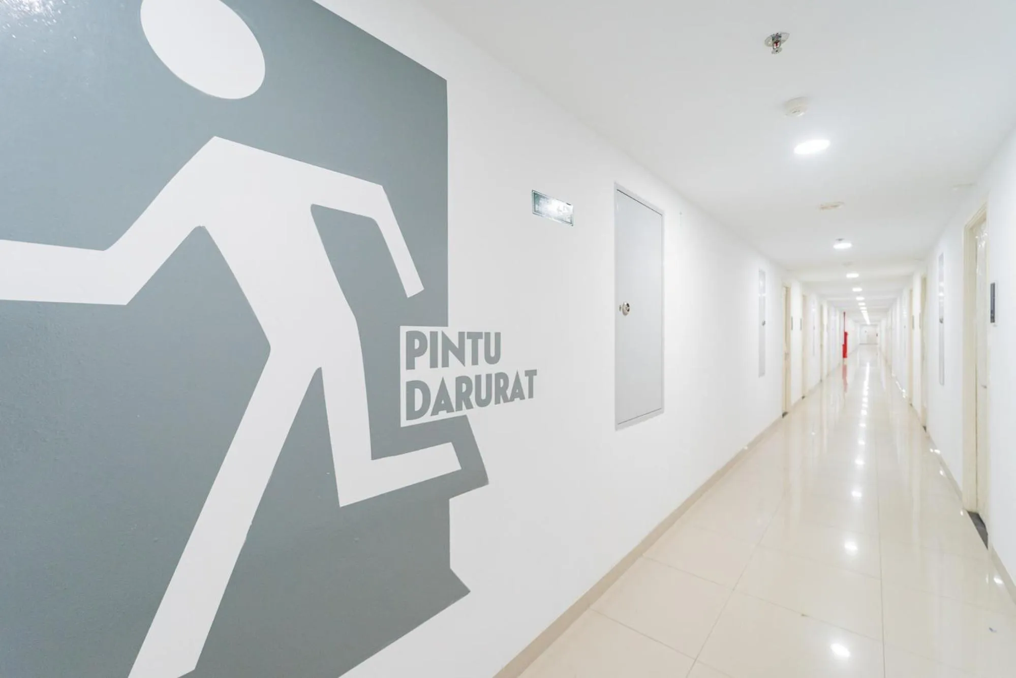 Property building in RedLiving Apartemen Patra Land Urbano - Happy Rooms Tower Mid-West with Netflix