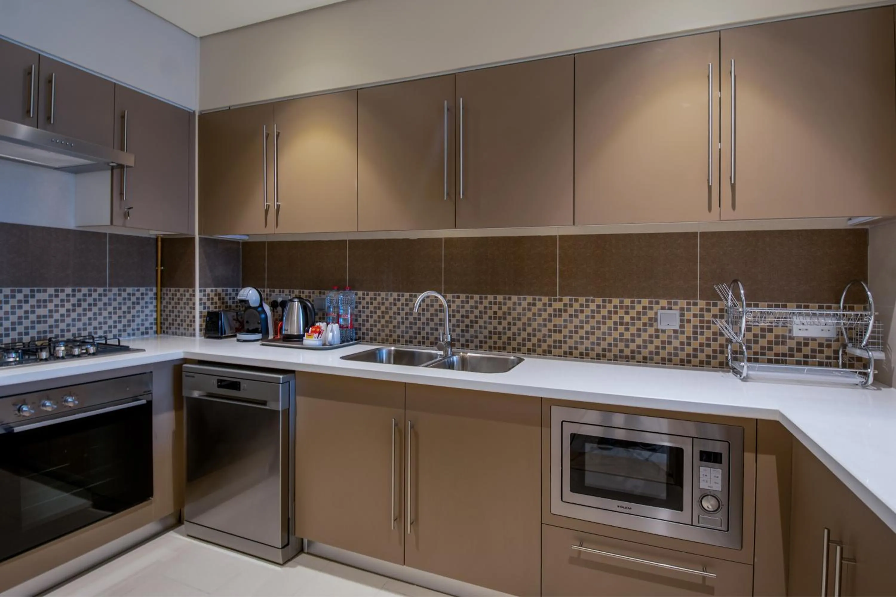 Kitchen or kitchenette in Jood Hotel Apartments