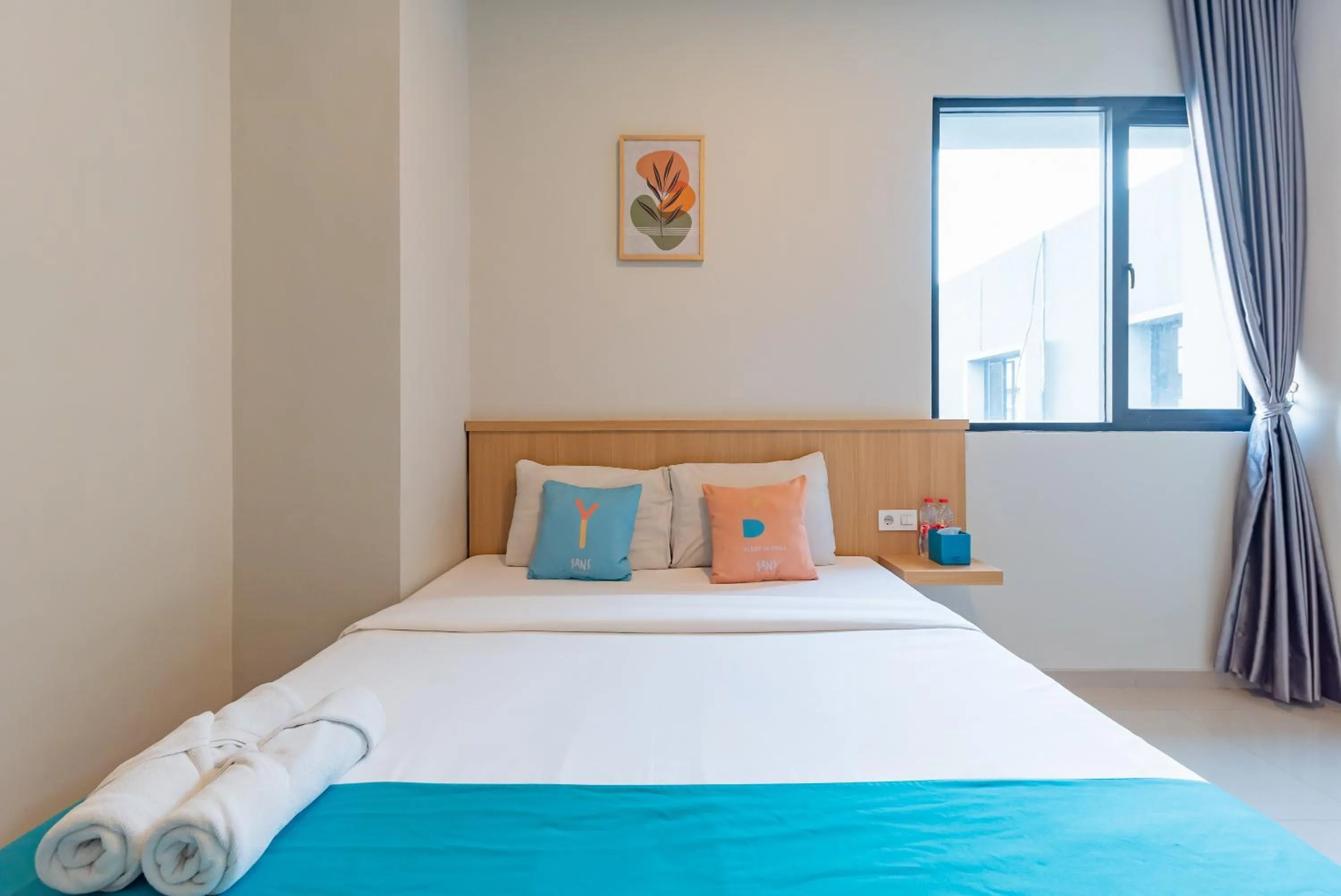 Bedroom, Bed in Sans Hotel Bobosini Malang by RedDoorz