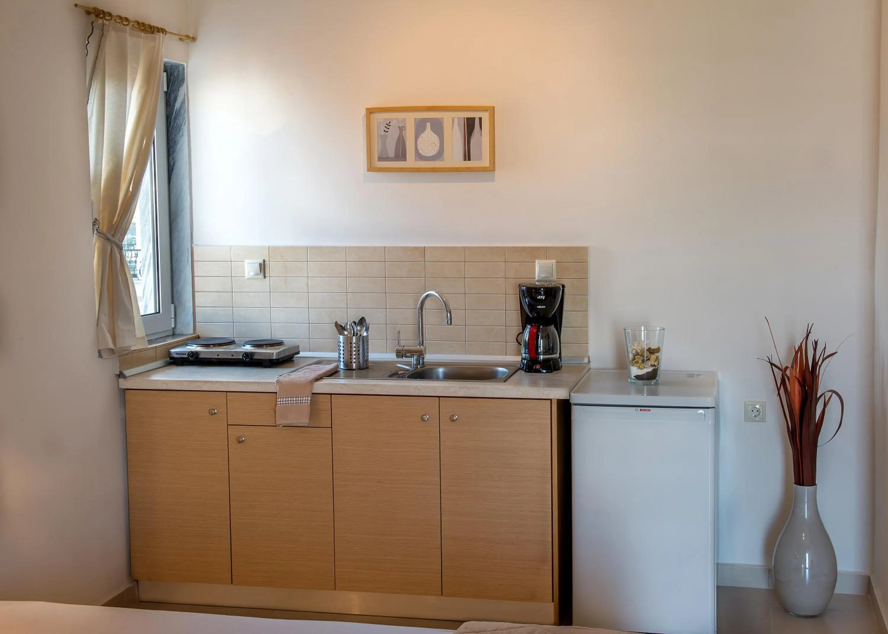 Kitchen or kitchenette in Nepheli Apartments and Studios