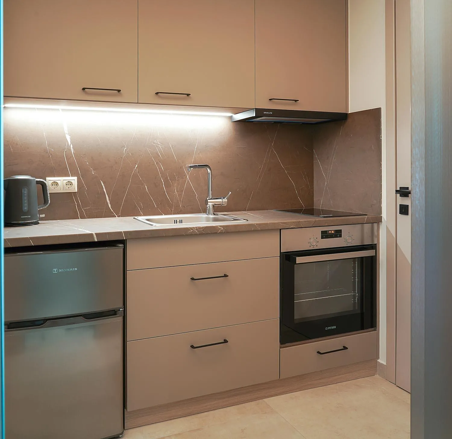 Kitchen or kitchenette in Nepheli Apartments and Studios