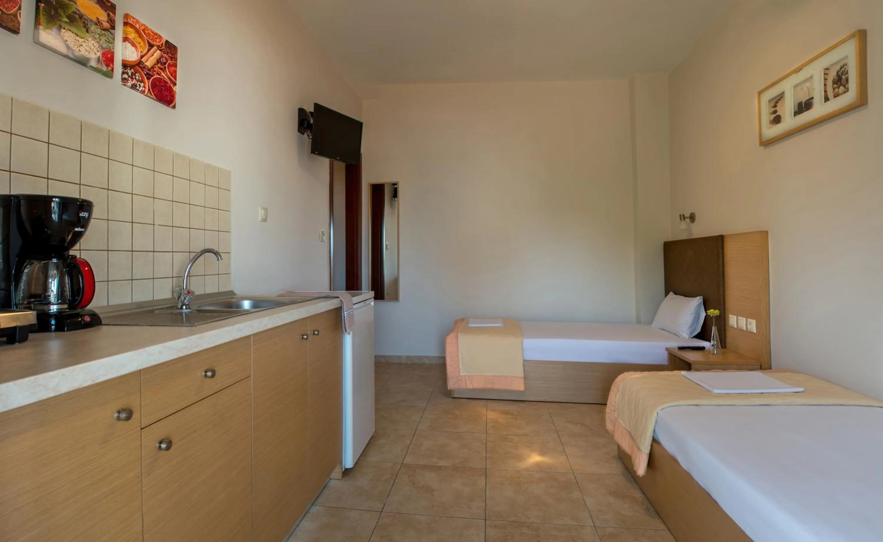 Kitchen or kitchenette, Bed in Nepheli Apartments and Studios