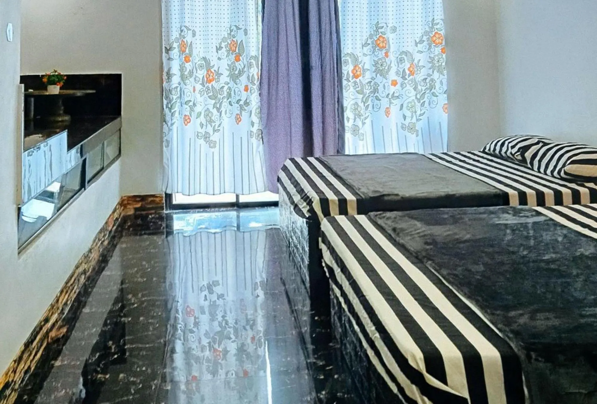 Bed in KrizLion Hotel