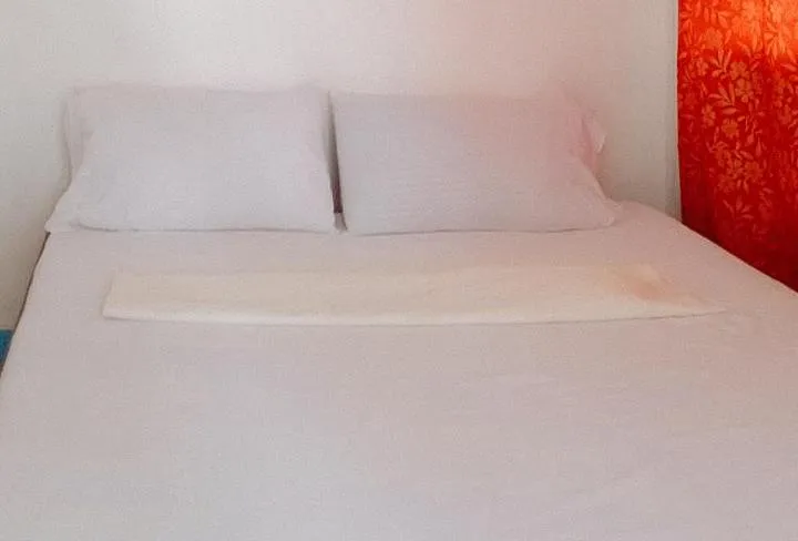 Shower, Bed in RedDoorz @ Jmalls Island Tourist Inn Dinagat Island