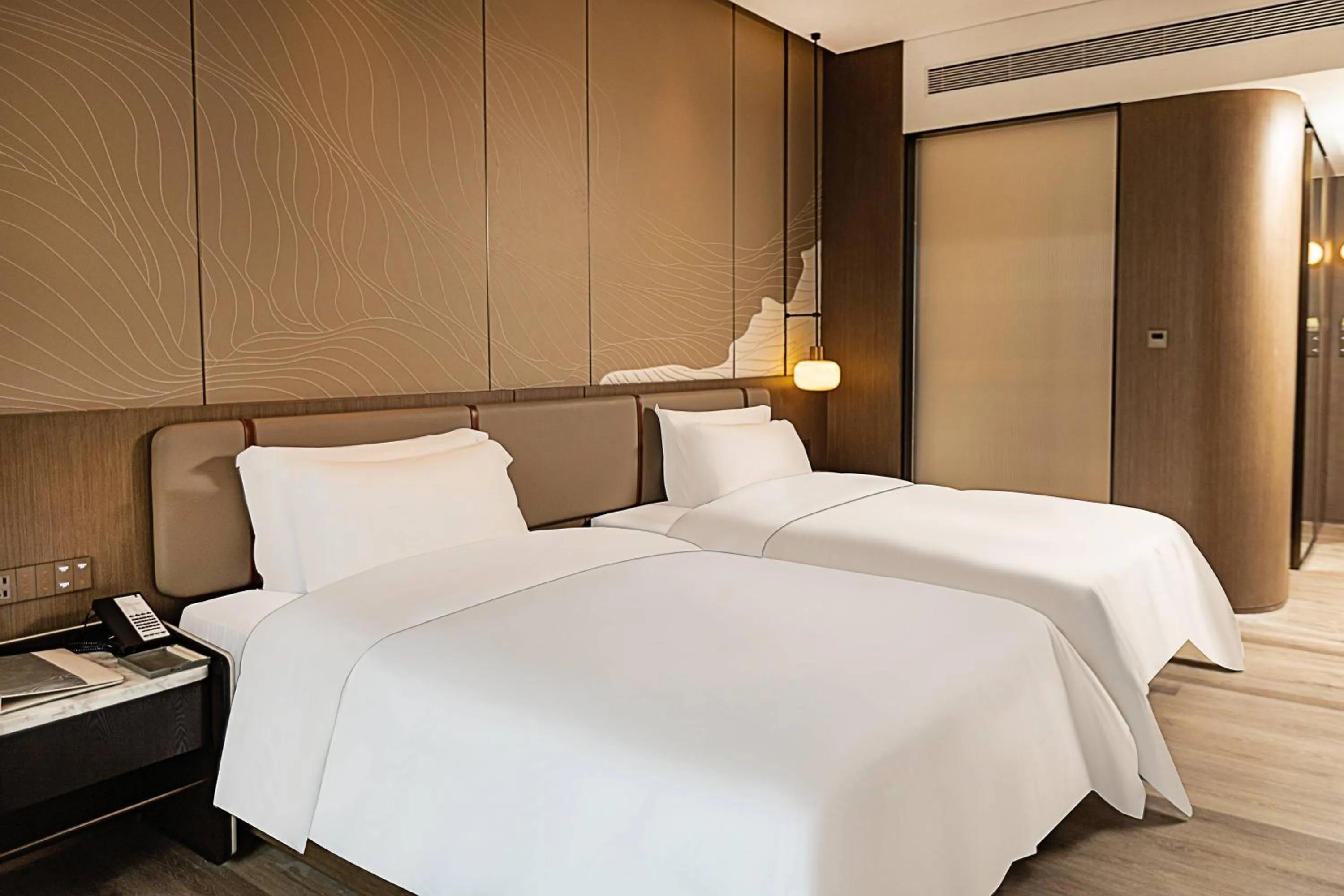Bed in Wyndham Garden Gaozhou