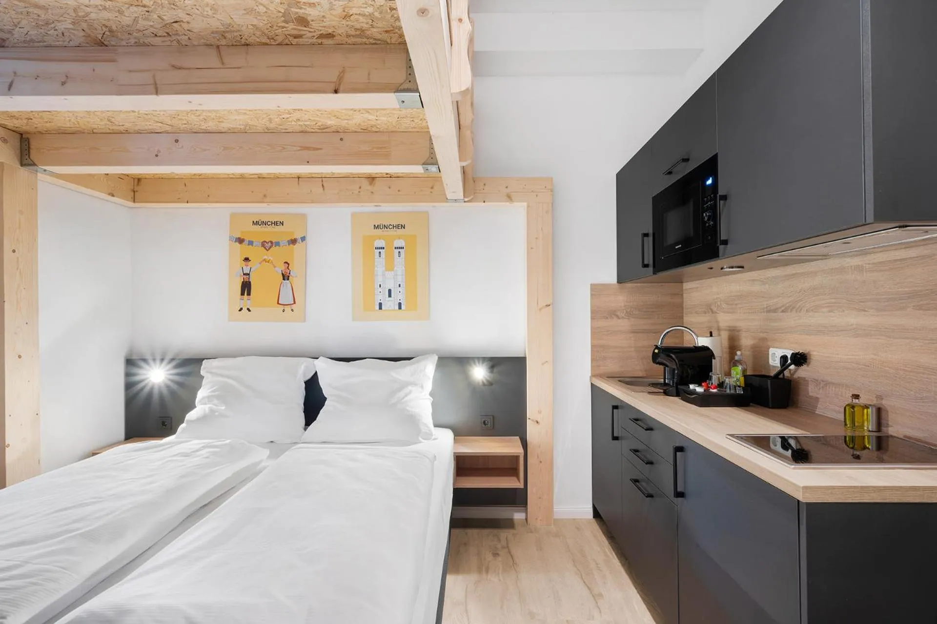 Bed in Servus Apartments by Homaris