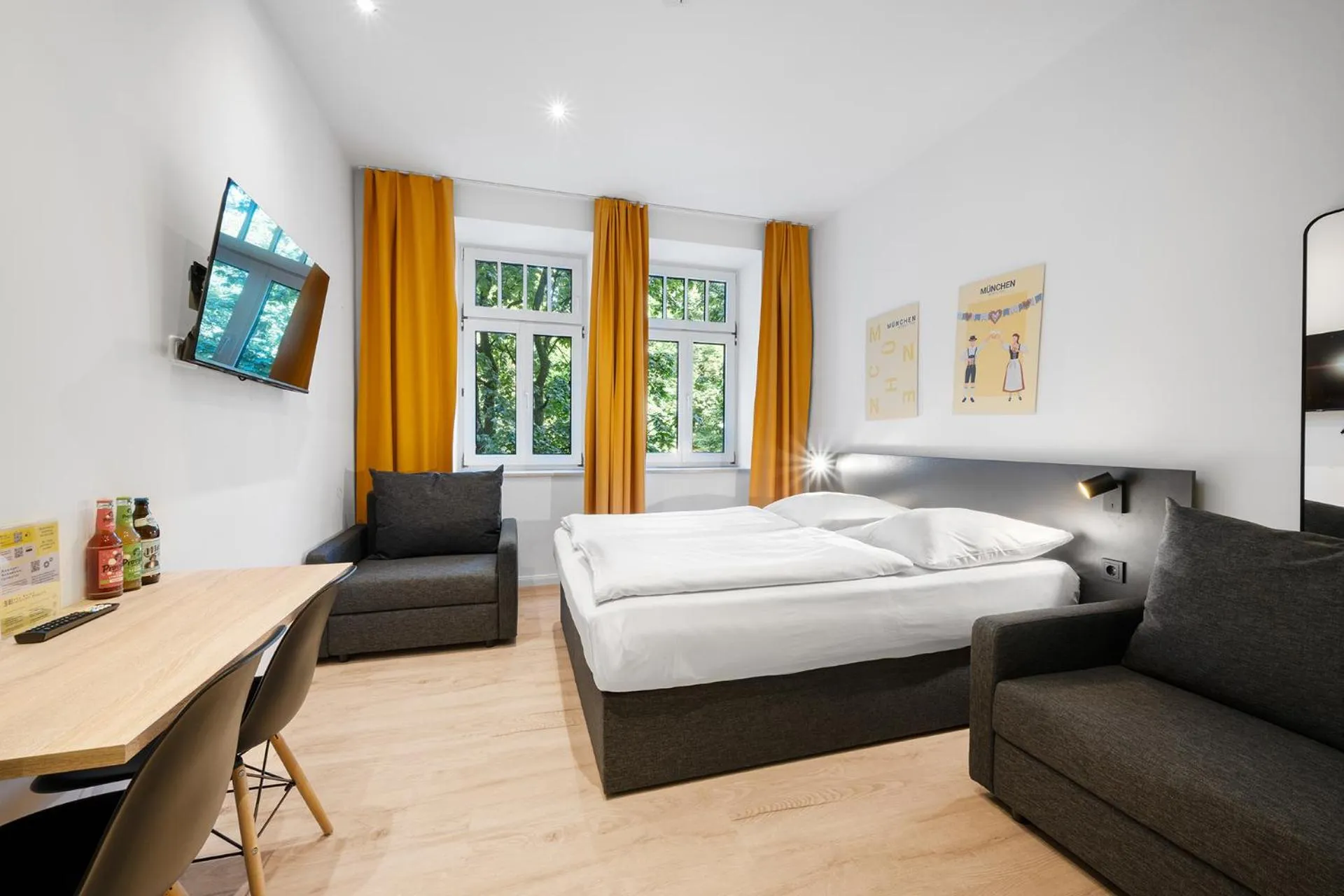 Bed in Servus Apartments by Homaris