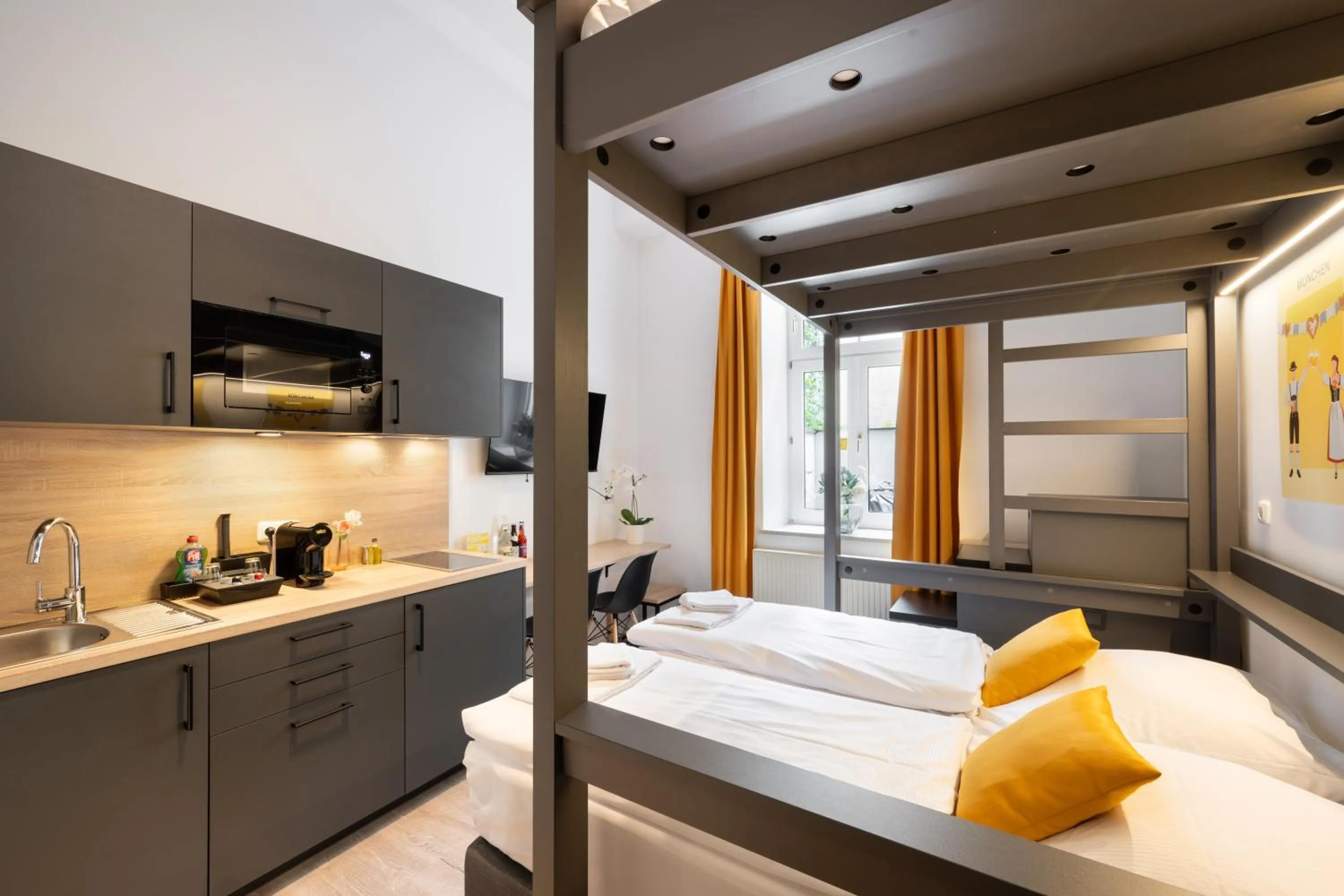 Bed in Servus Apartments by Homaris