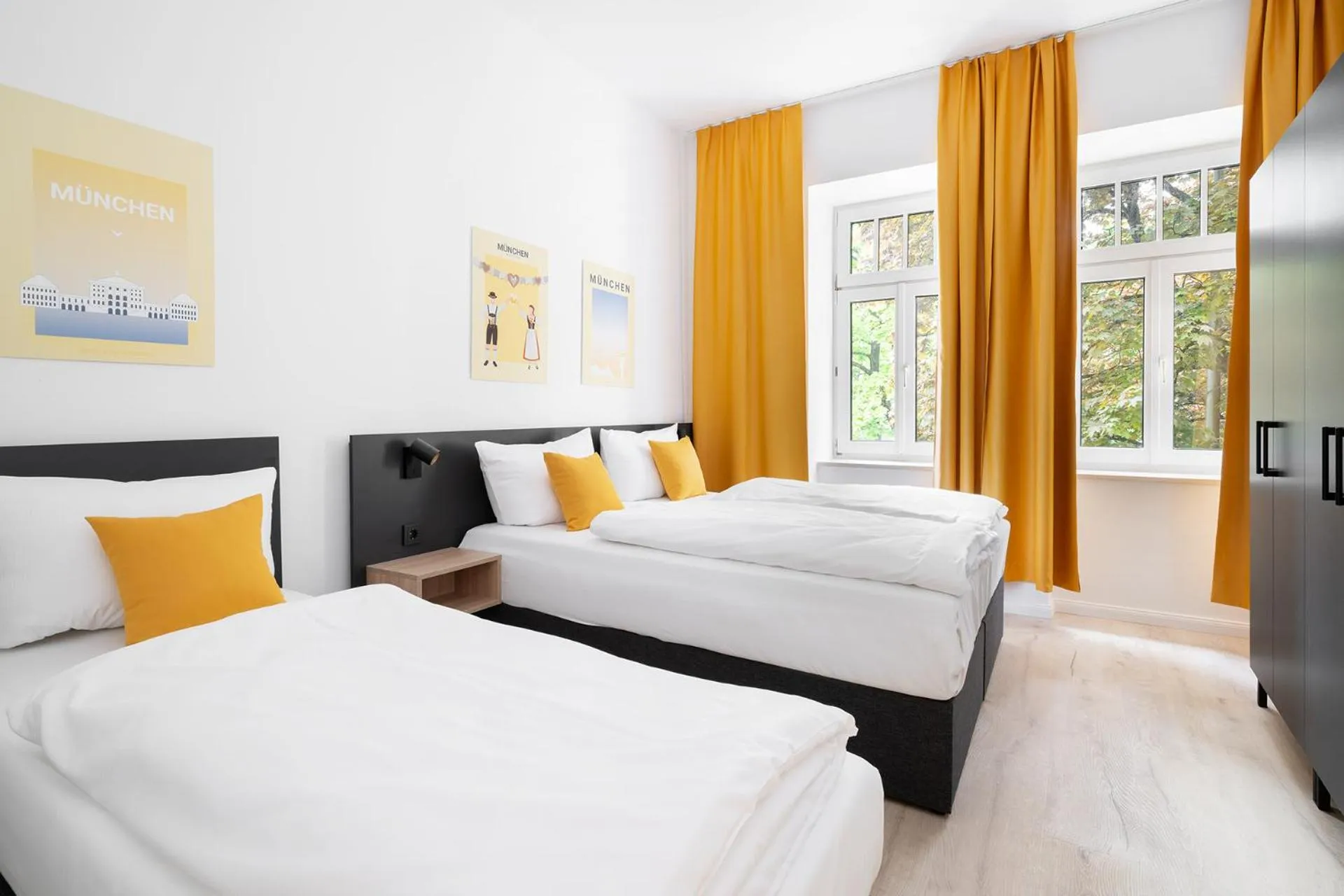 Bed in Servus Apartments by Homaris