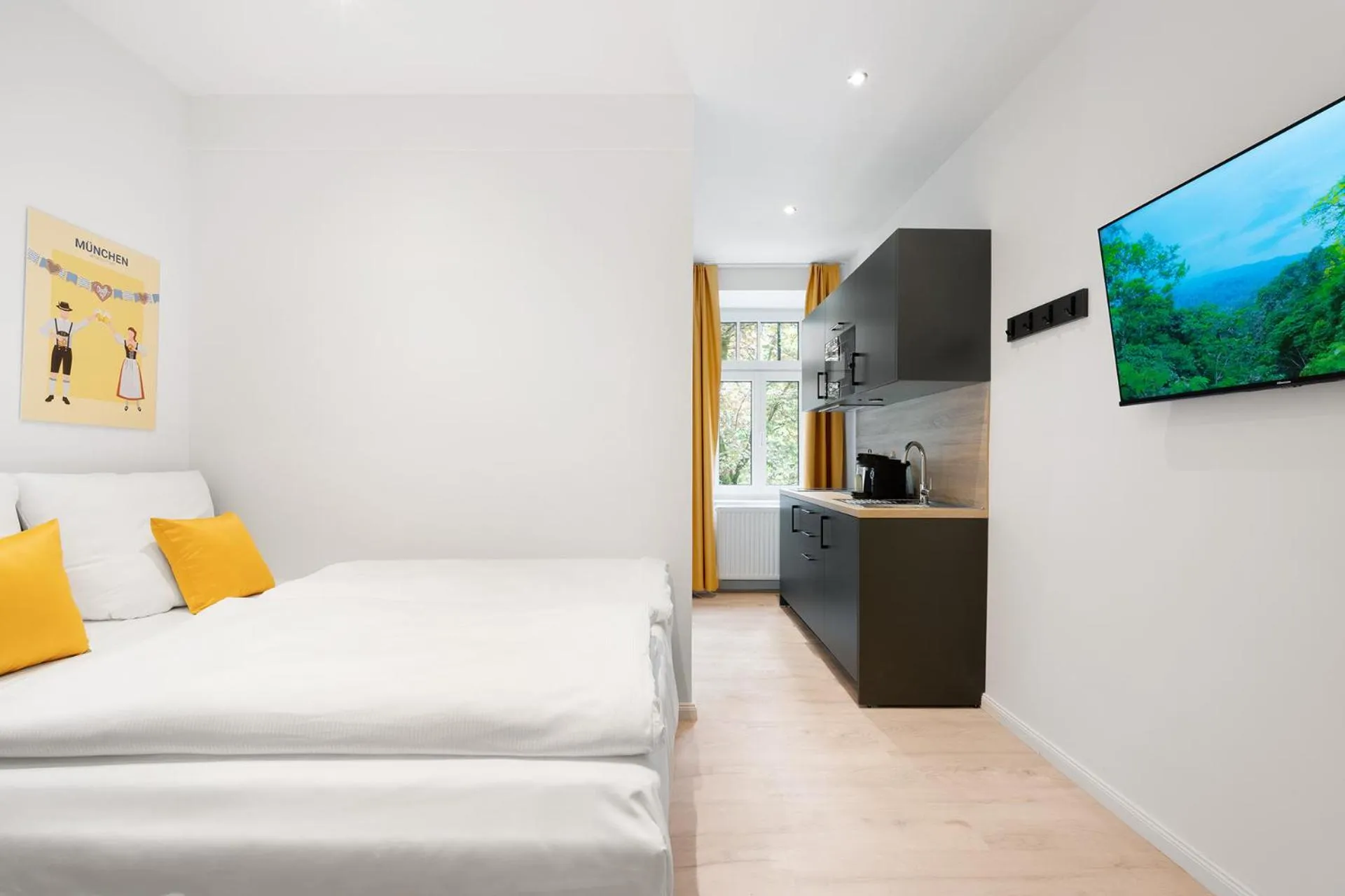 Bed in Servus Apartments by Homaris