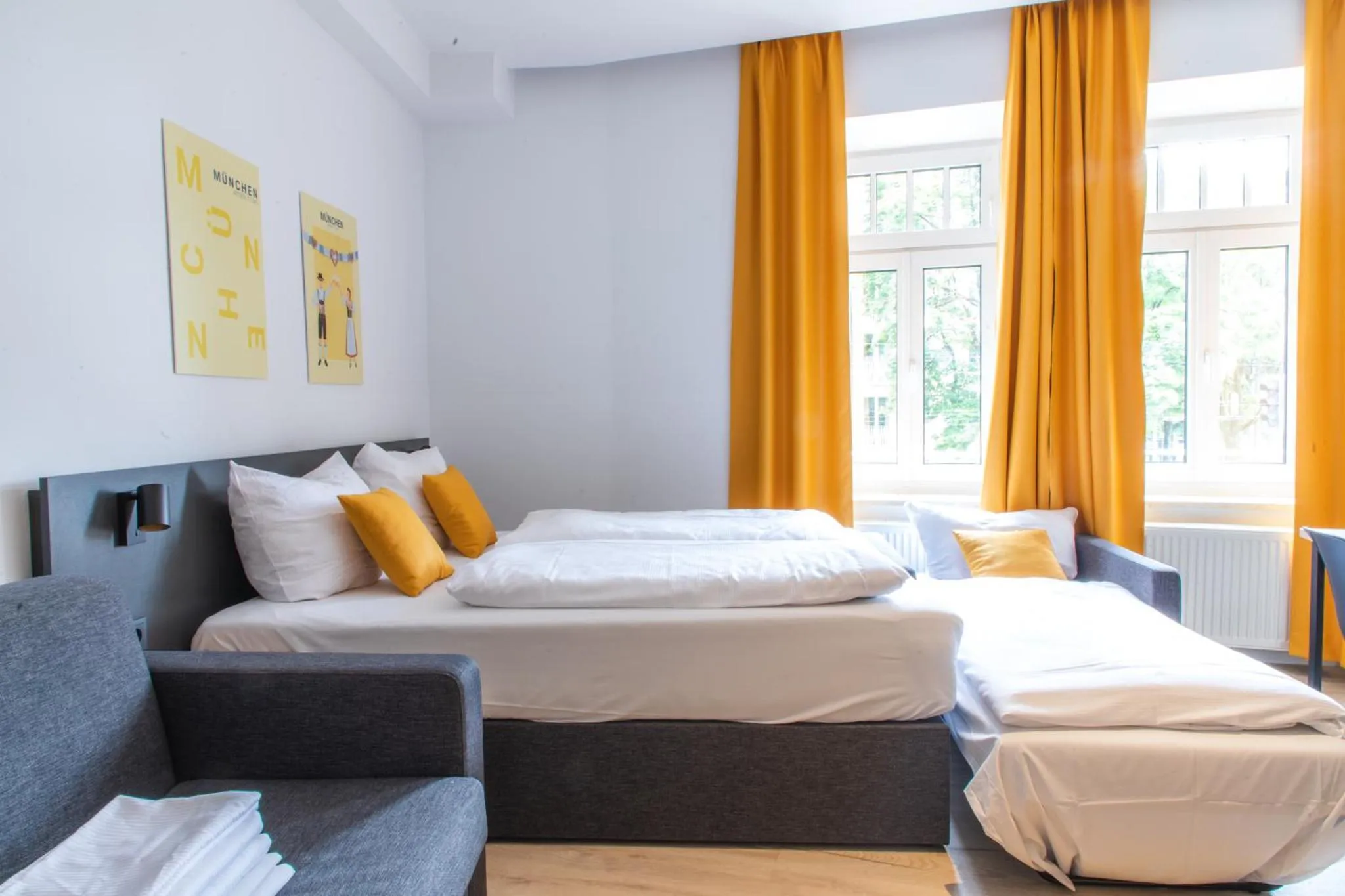 Bed in Servus Apartments by Homaris