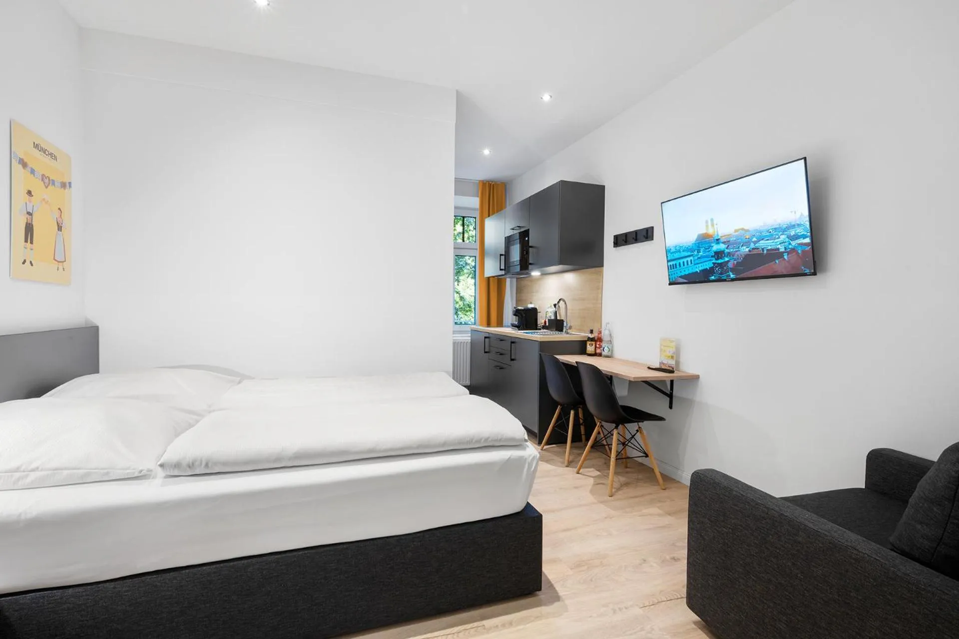 Bed in Servus Apartments by Homaris