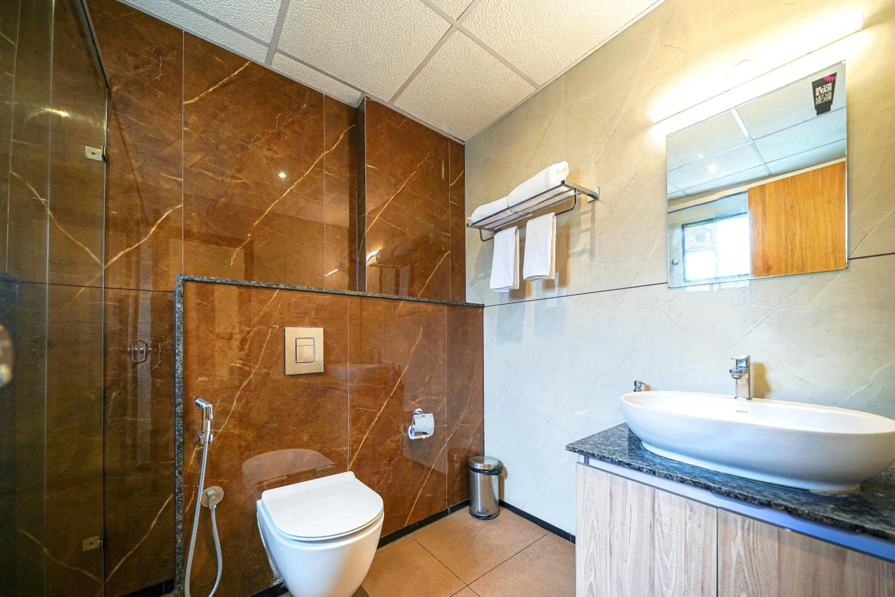 Toilet in Olive Hotel HAL 2nd Stage by Embassy Group