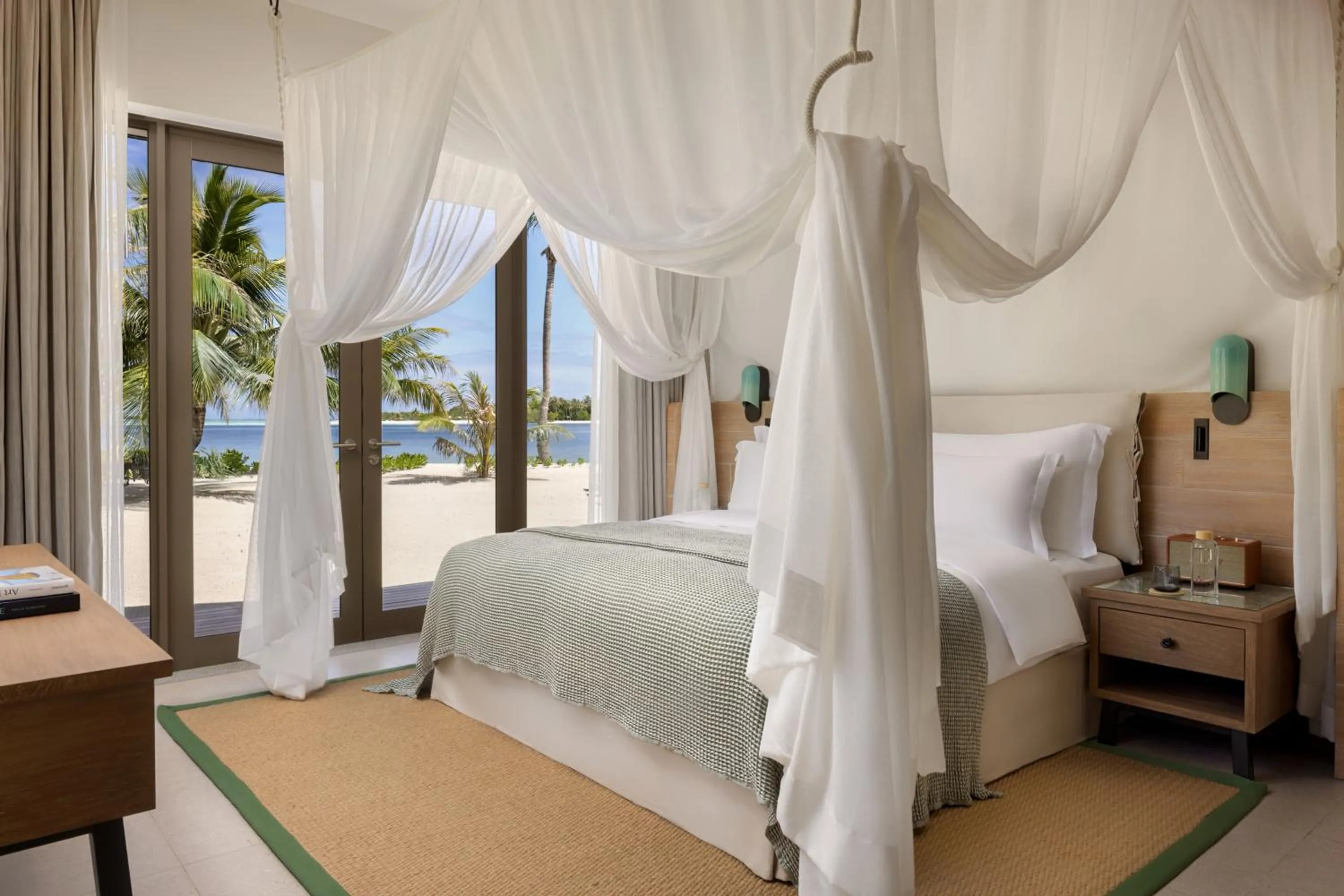 Bed in Six Senses Kanuhura