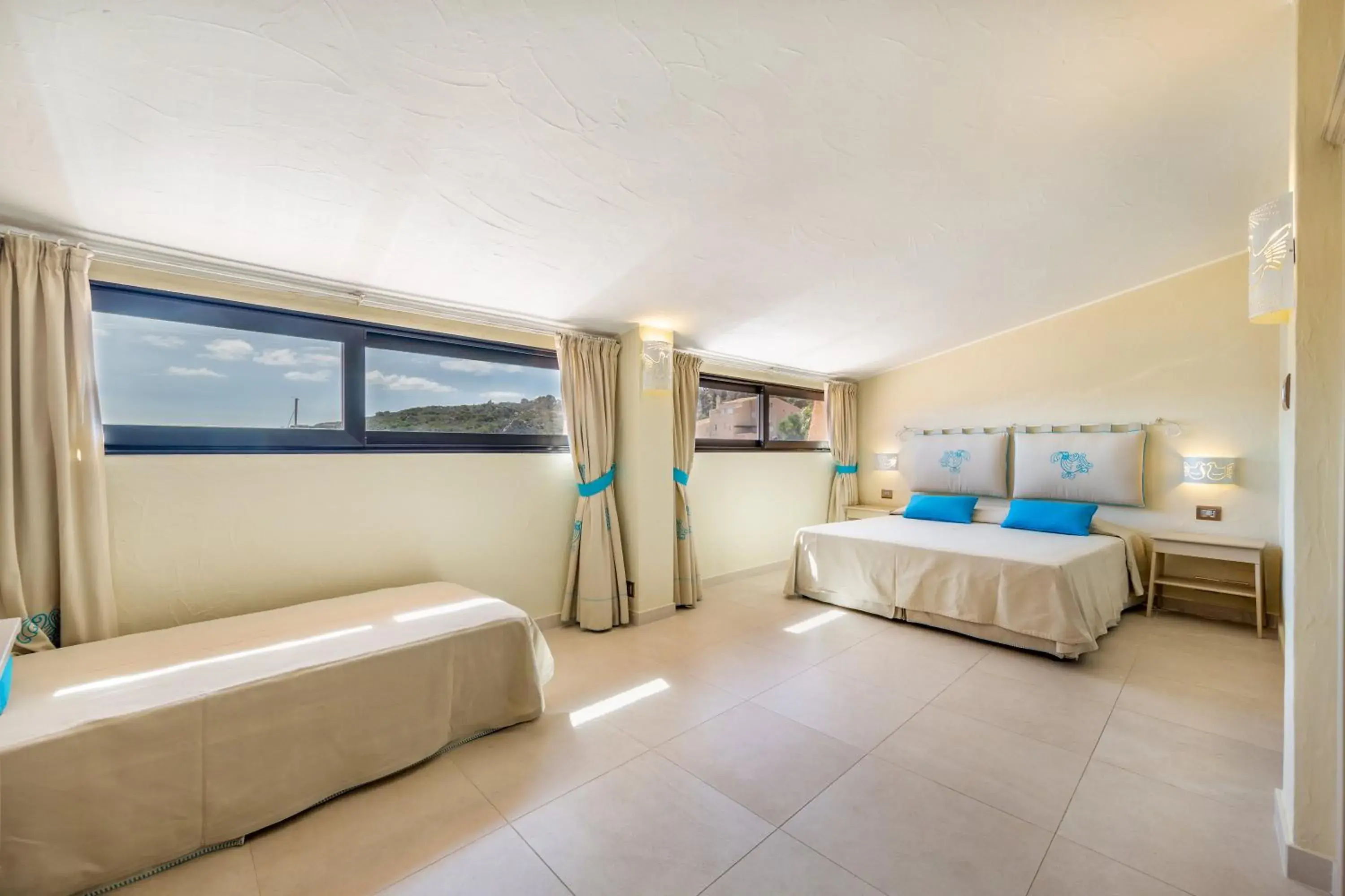 Triple Room with Sea View in Hotel Cala Lunga Triple Room with Sea View in Hotel Cala Lunga