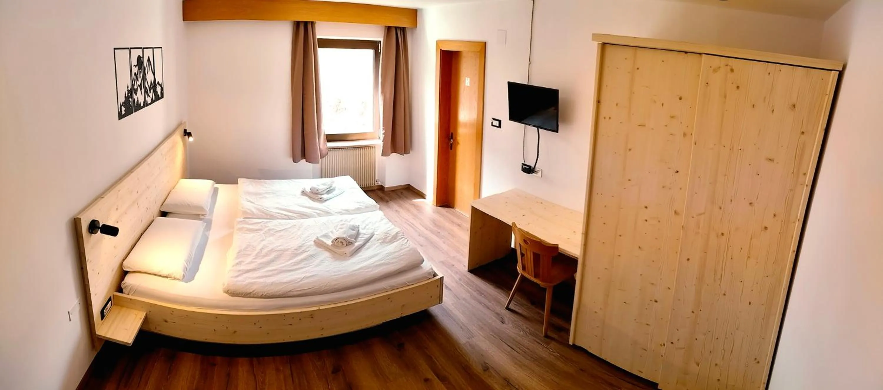 Bed in Alpin Hotel & Restaurant Frara