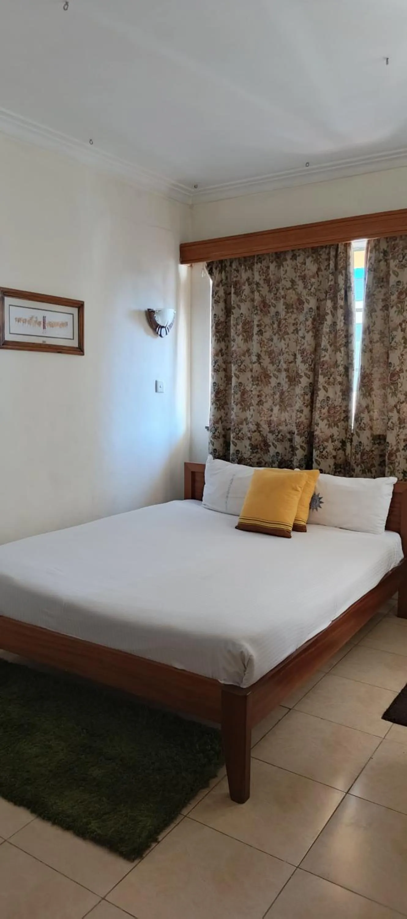 Bed in Kenya Comfort Hotel