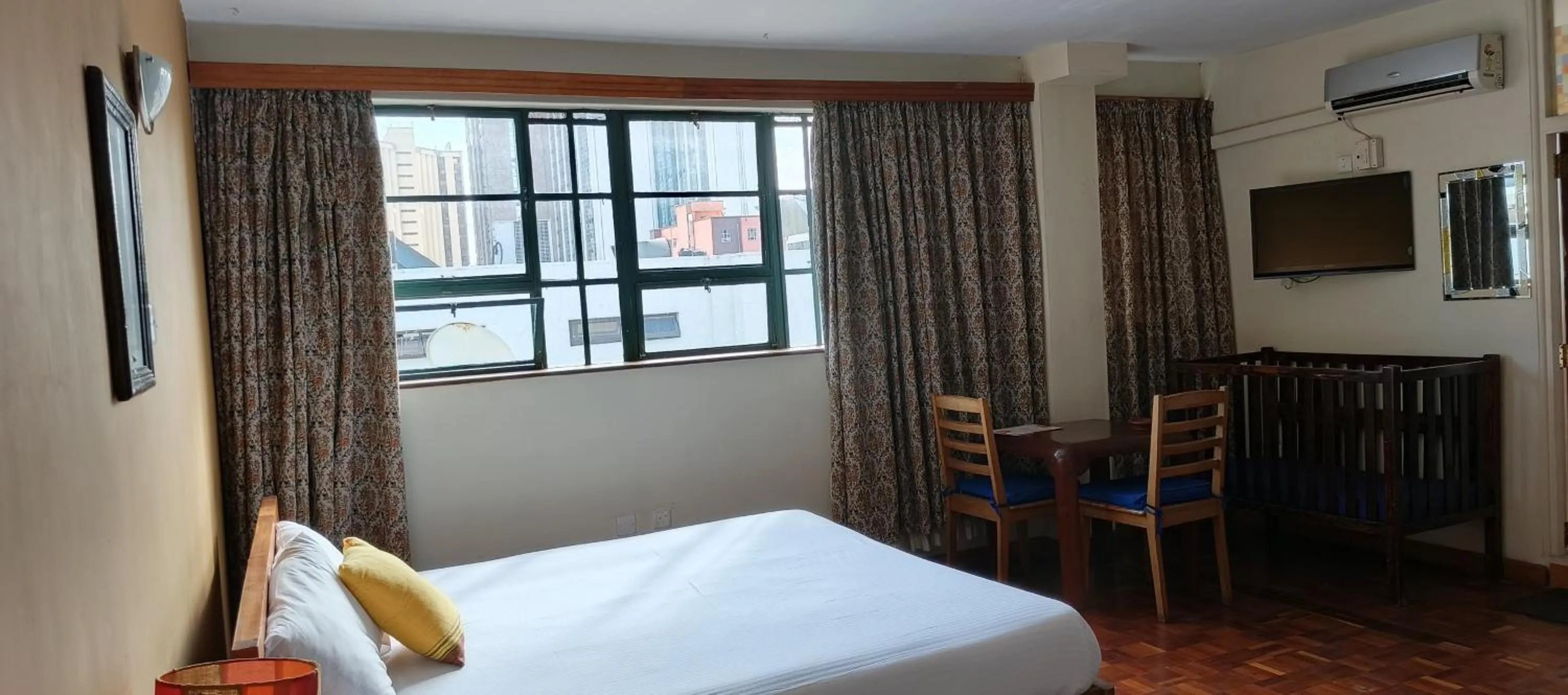 Photo of the whole room, Bed in Kenya Comfort Hotel