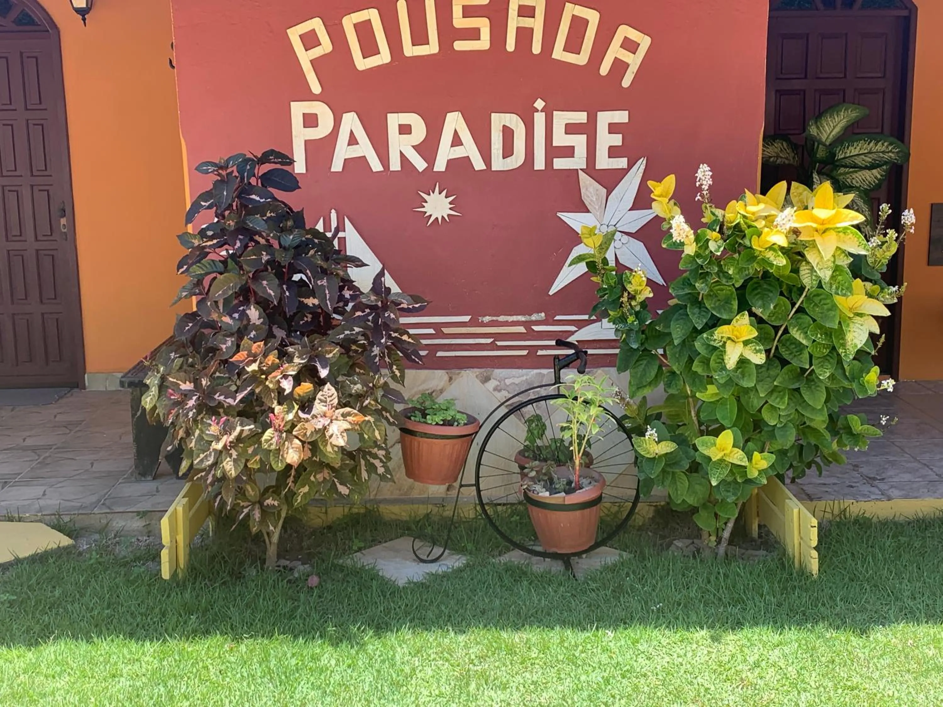 Property logo or sign in Pousada Paradise