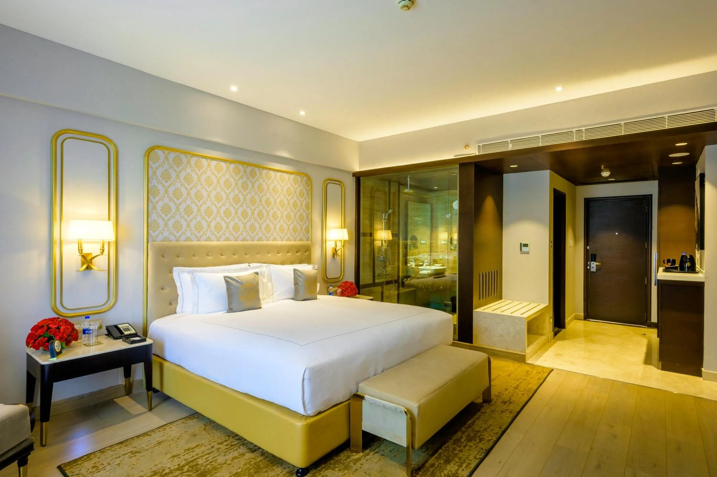 Bed in Taj Gandhinagar Resort and Spa