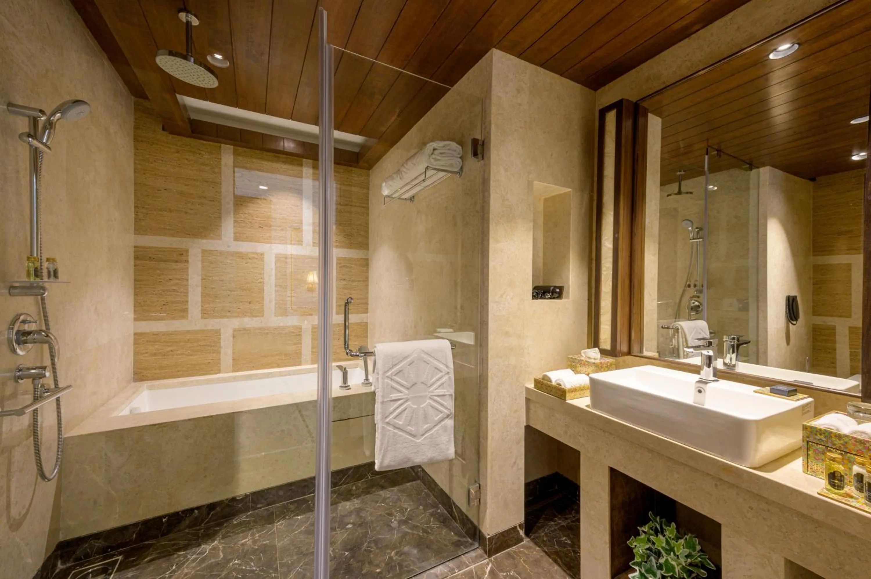 Shower in Taj Gandhinagar Resort and Spa