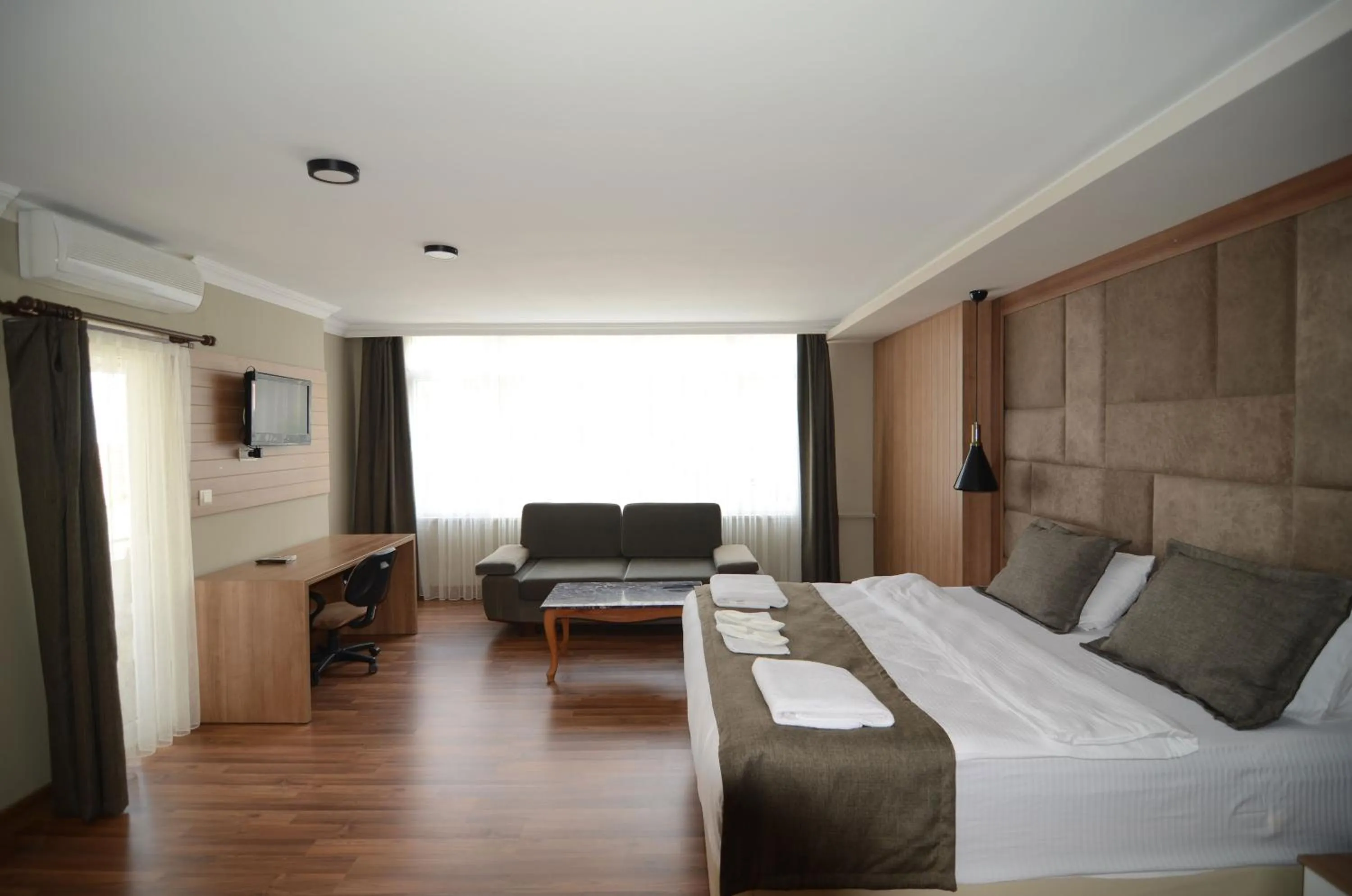 Photo of the whole room, Bed in Nova Suite Residence