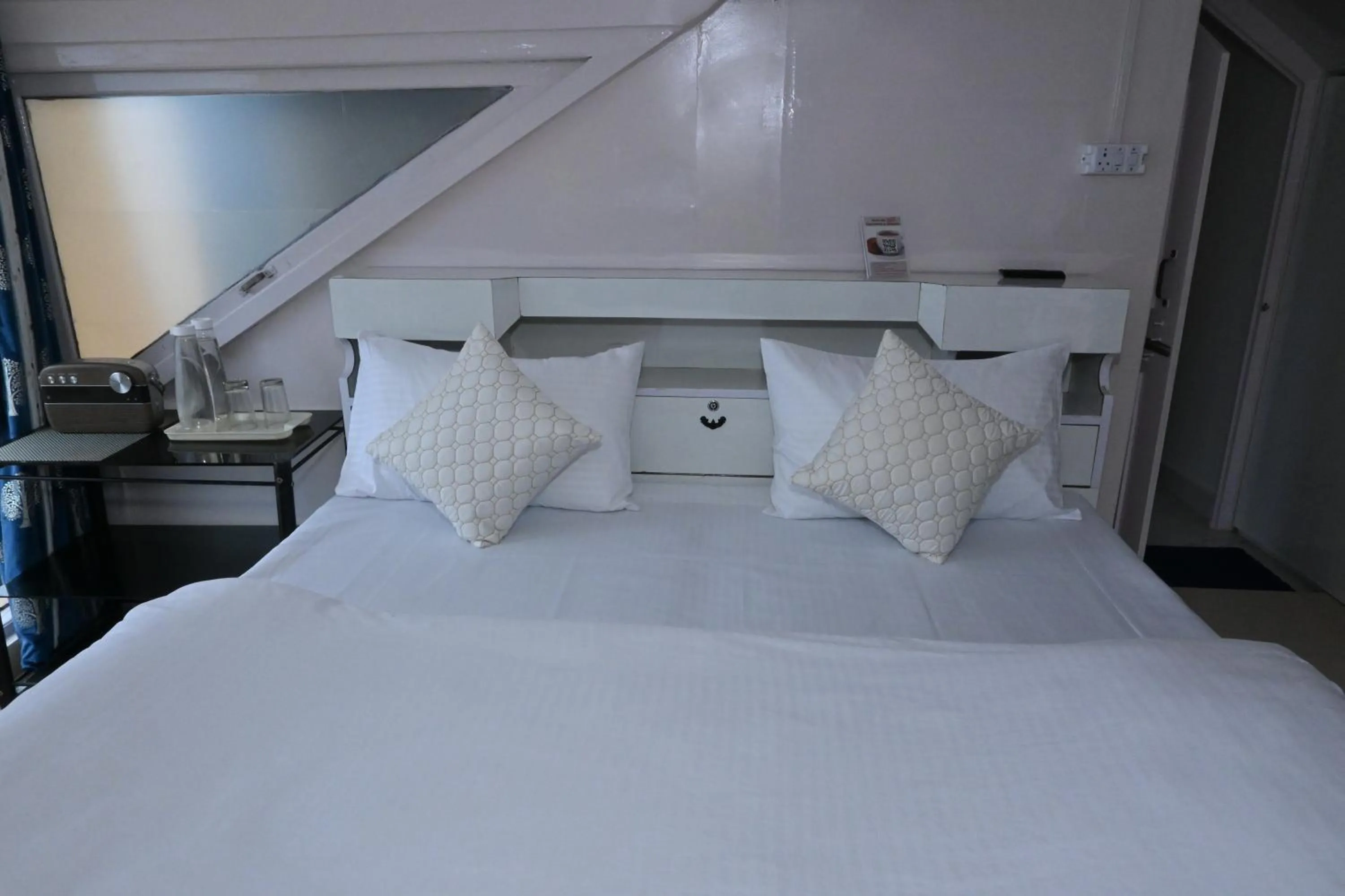 Bed in Om Niwas Homestay