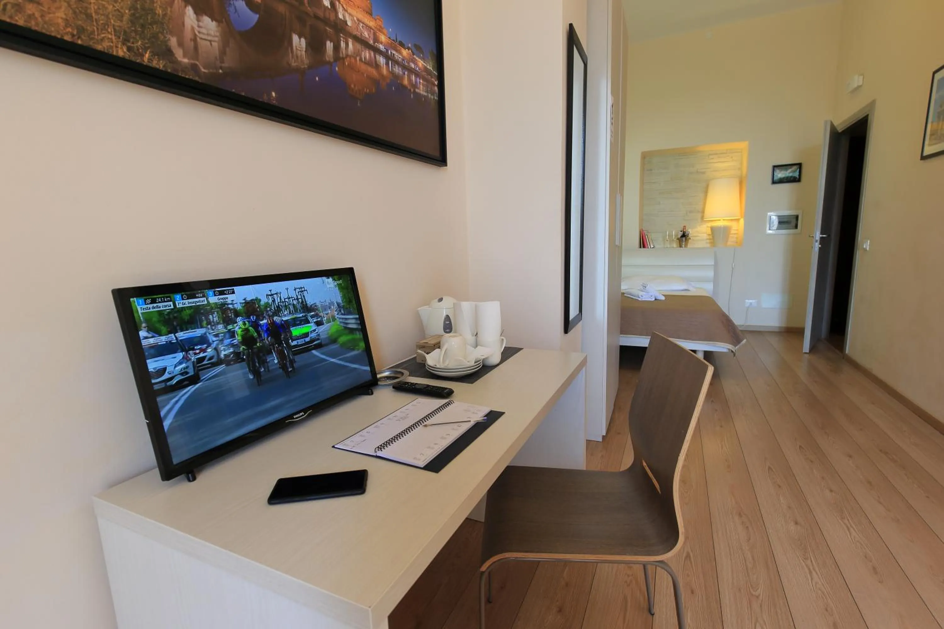 Communal lounge/ TV room in Aria Rome Rooms