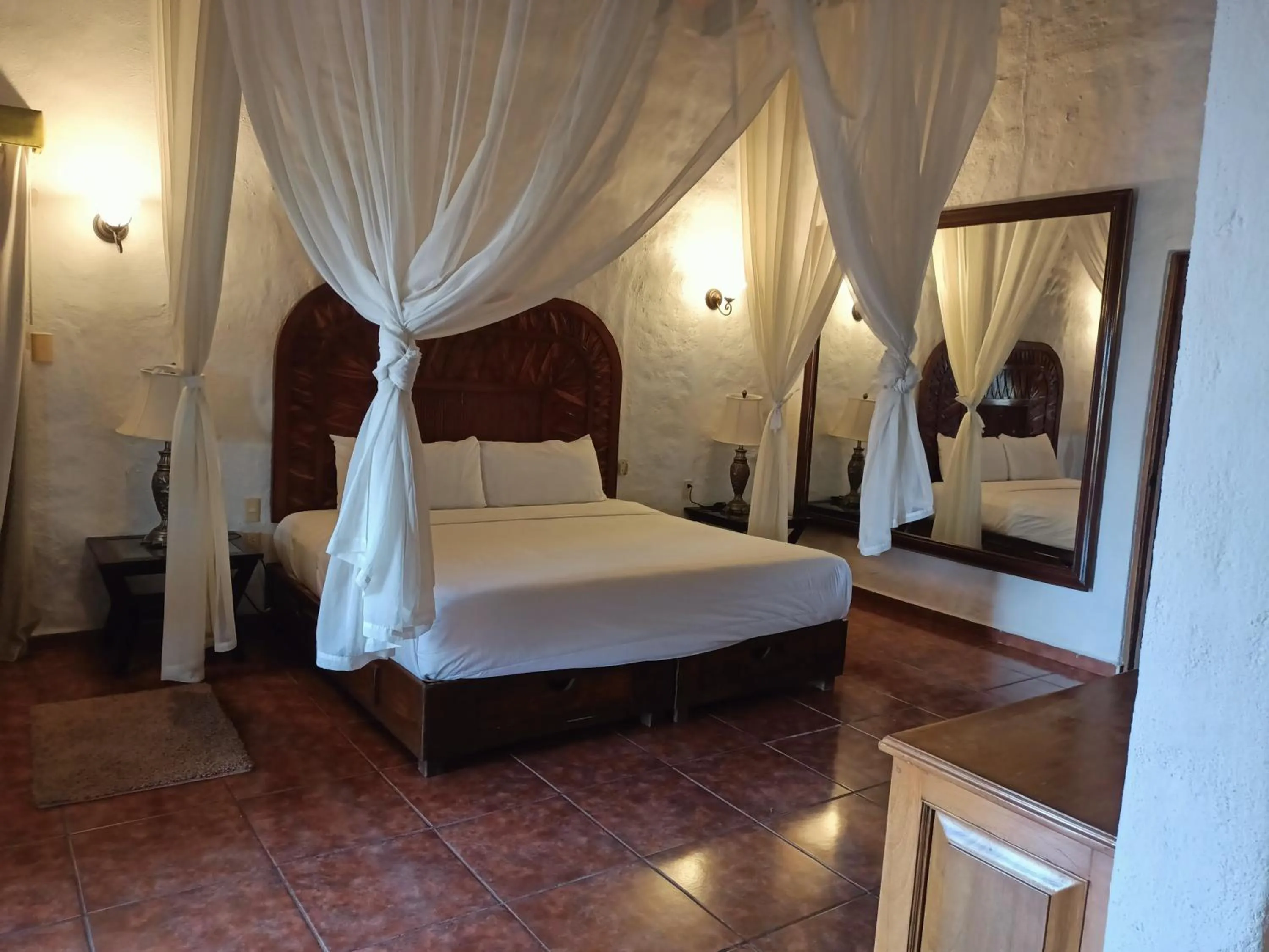 Bed in hotel plaza tucanes