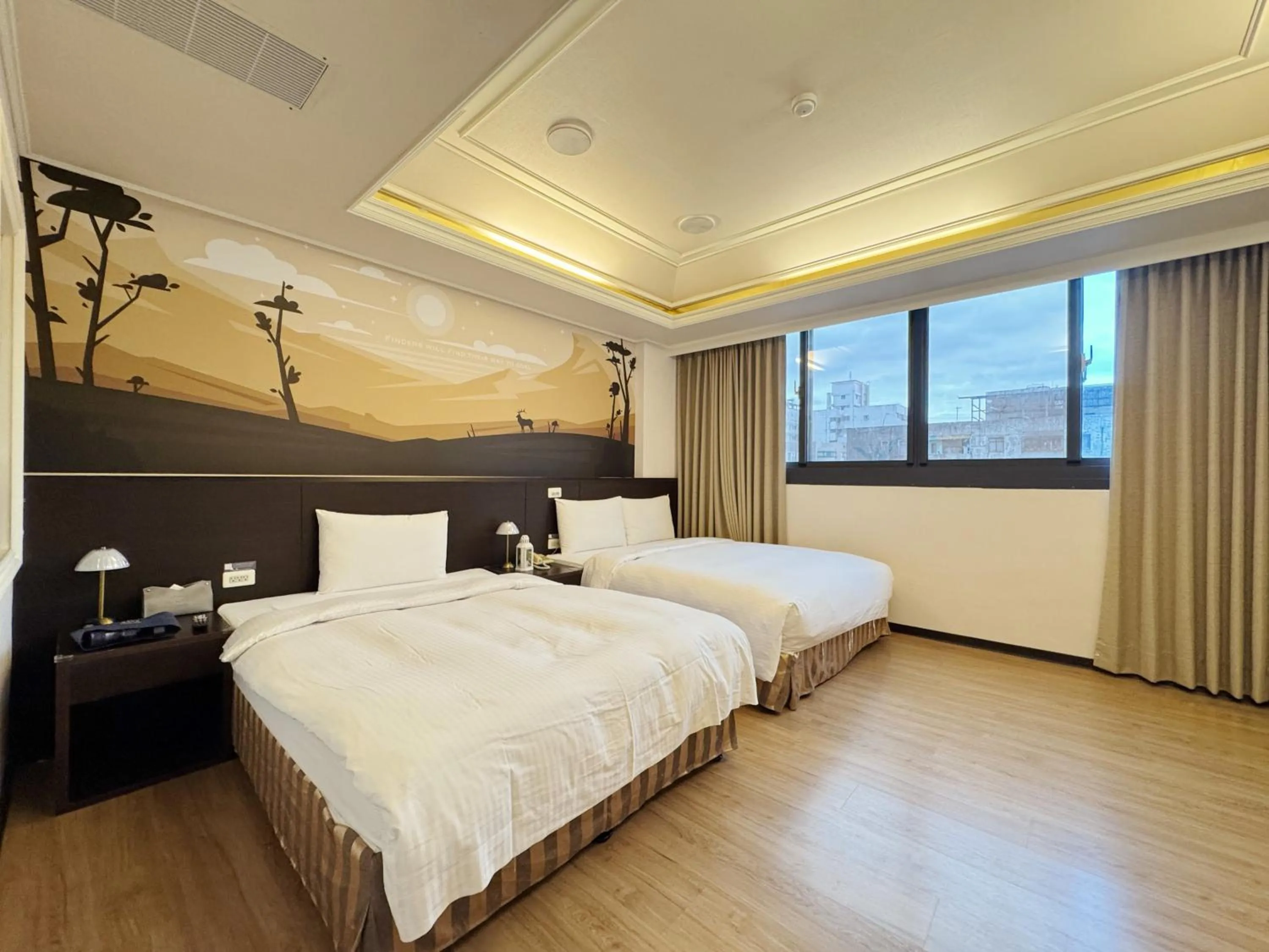 Photo of the whole room, Bed in Finders Hotel Hualien Station