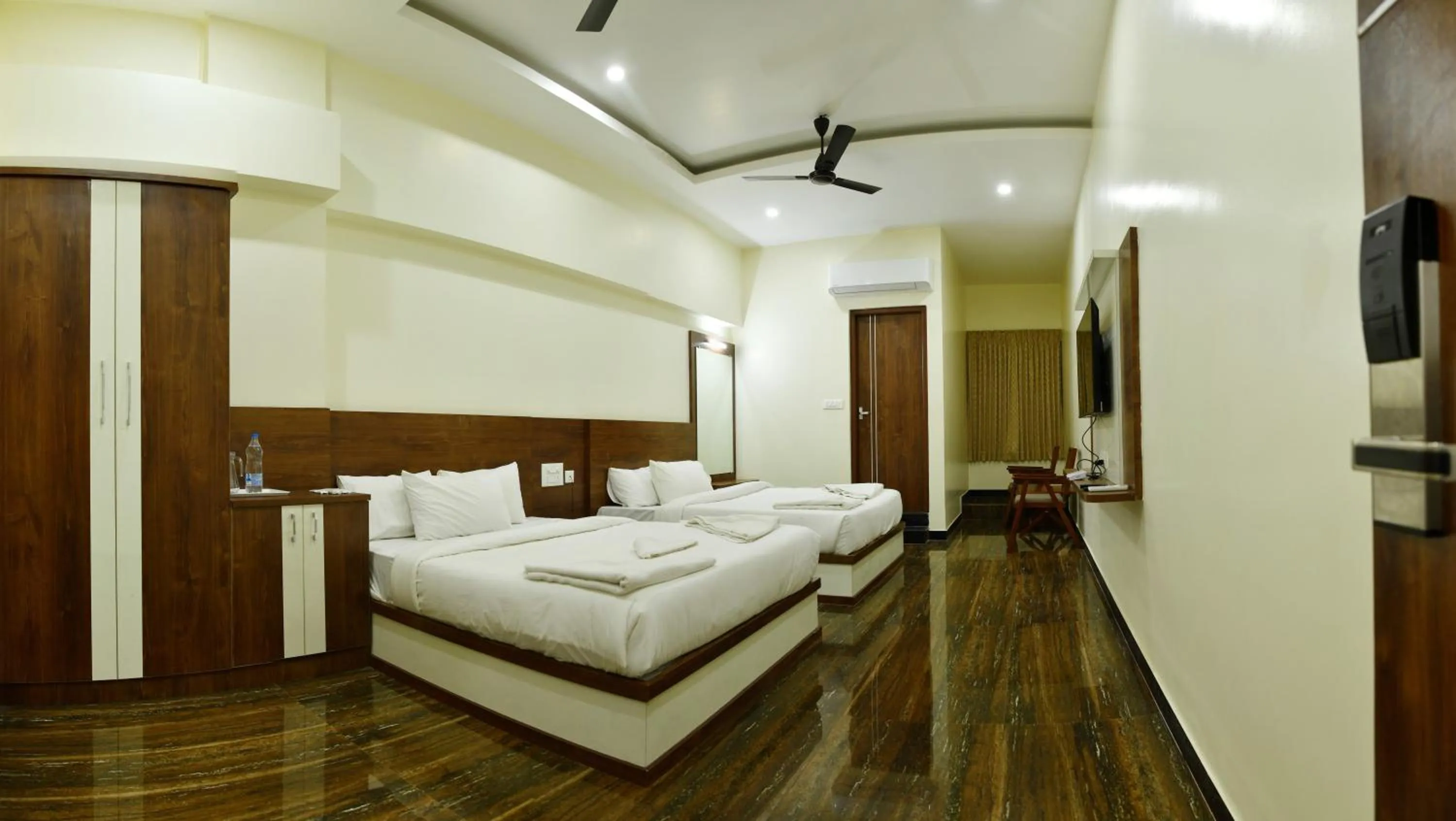 Bed in HOTEL NIVETHA INN