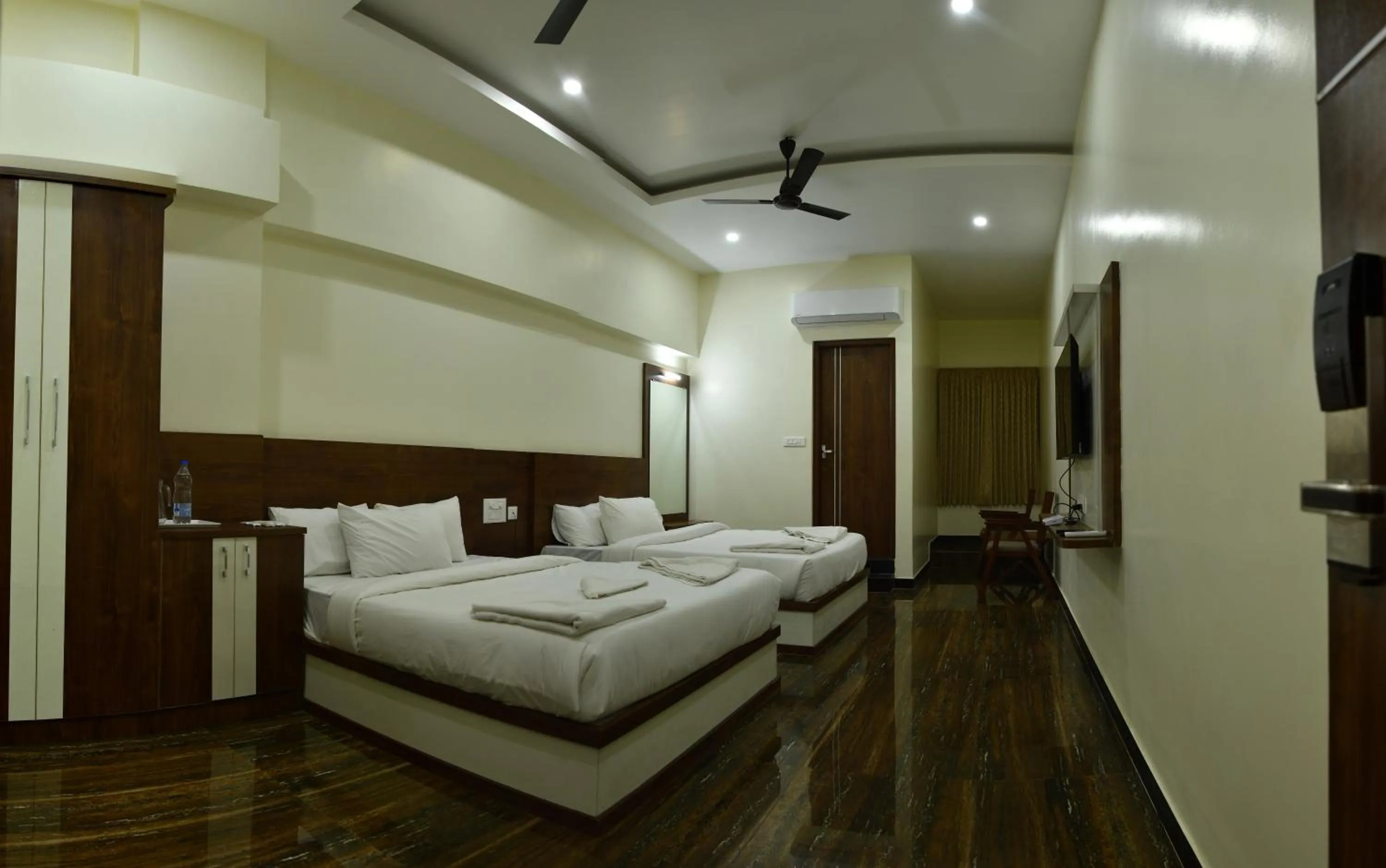 Bed in HOTEL NIVETHA INN