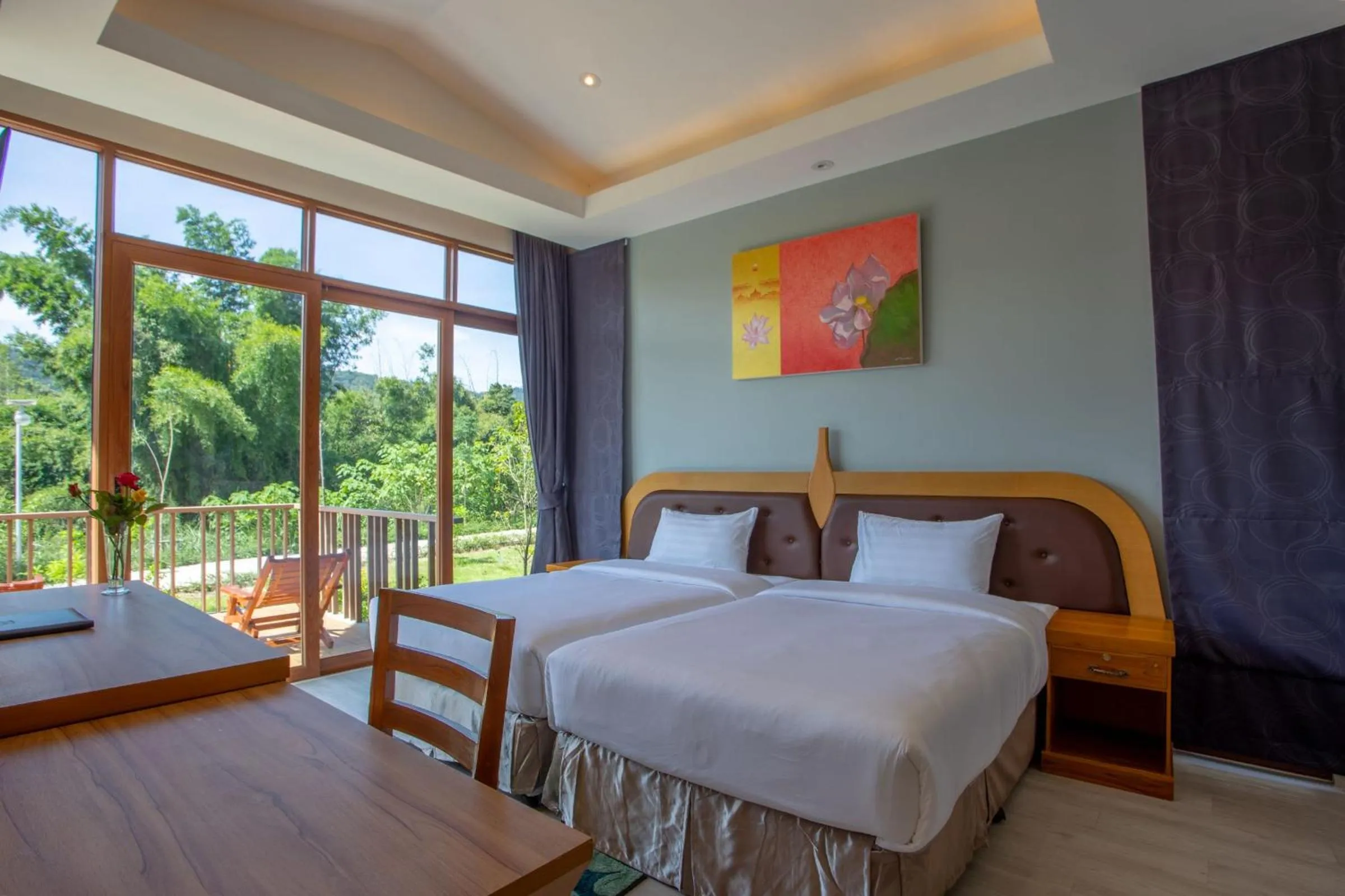 Bed in Nakaburi Sanctuary Resort&Spa