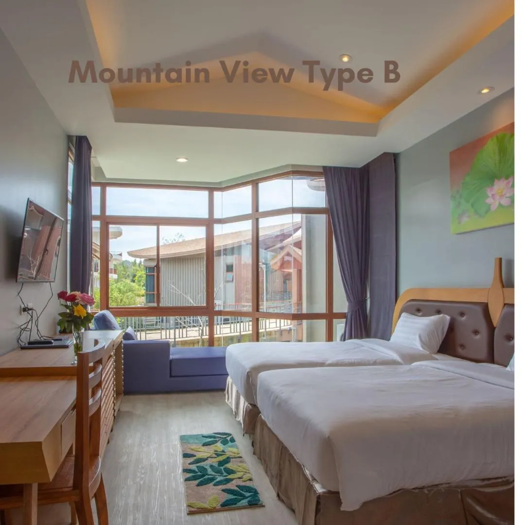 Bed in Nakaburi Sanctuary Resort&Spa