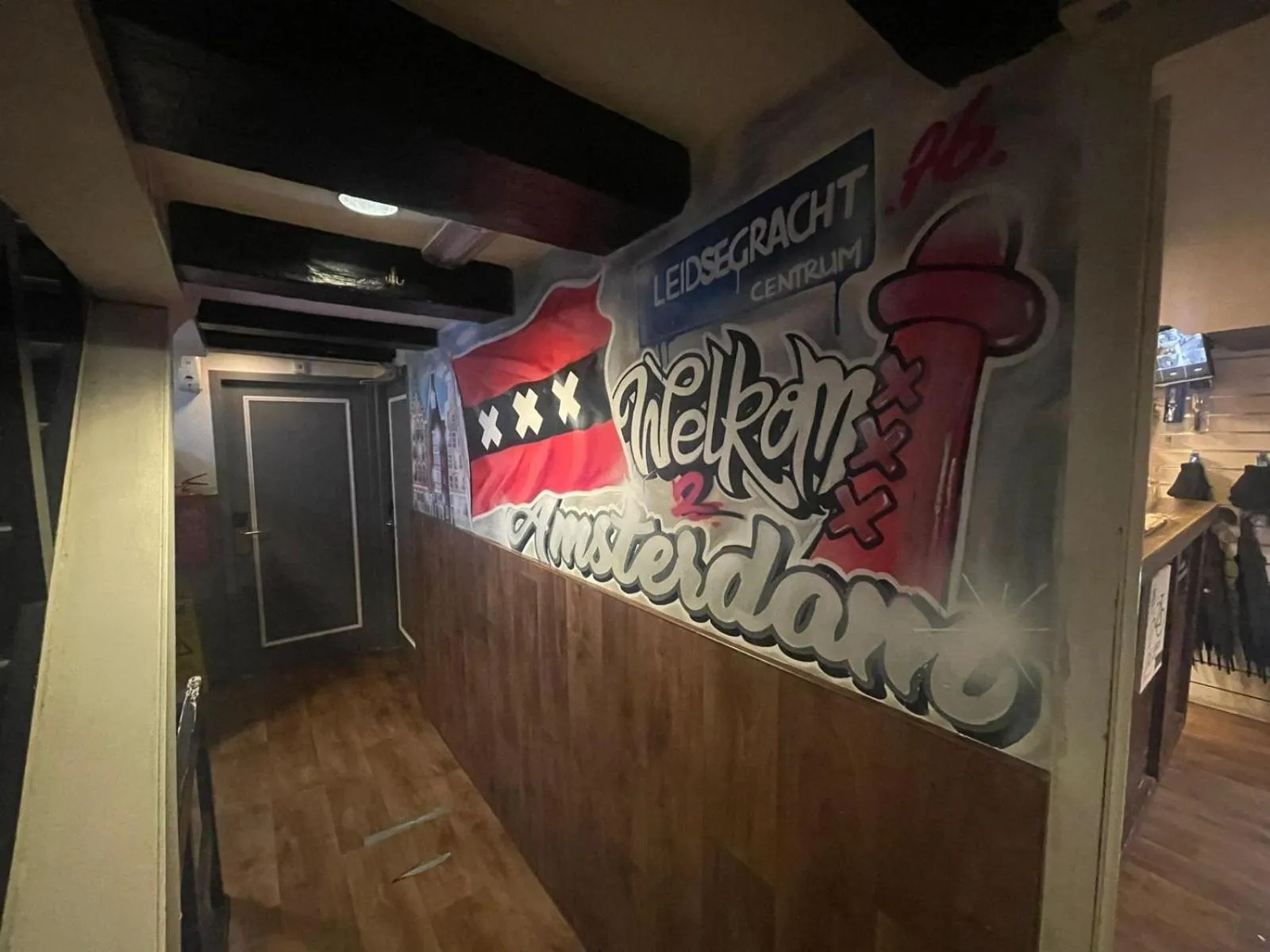 Communal lounge/ TV room in International Budget Hostel City Center