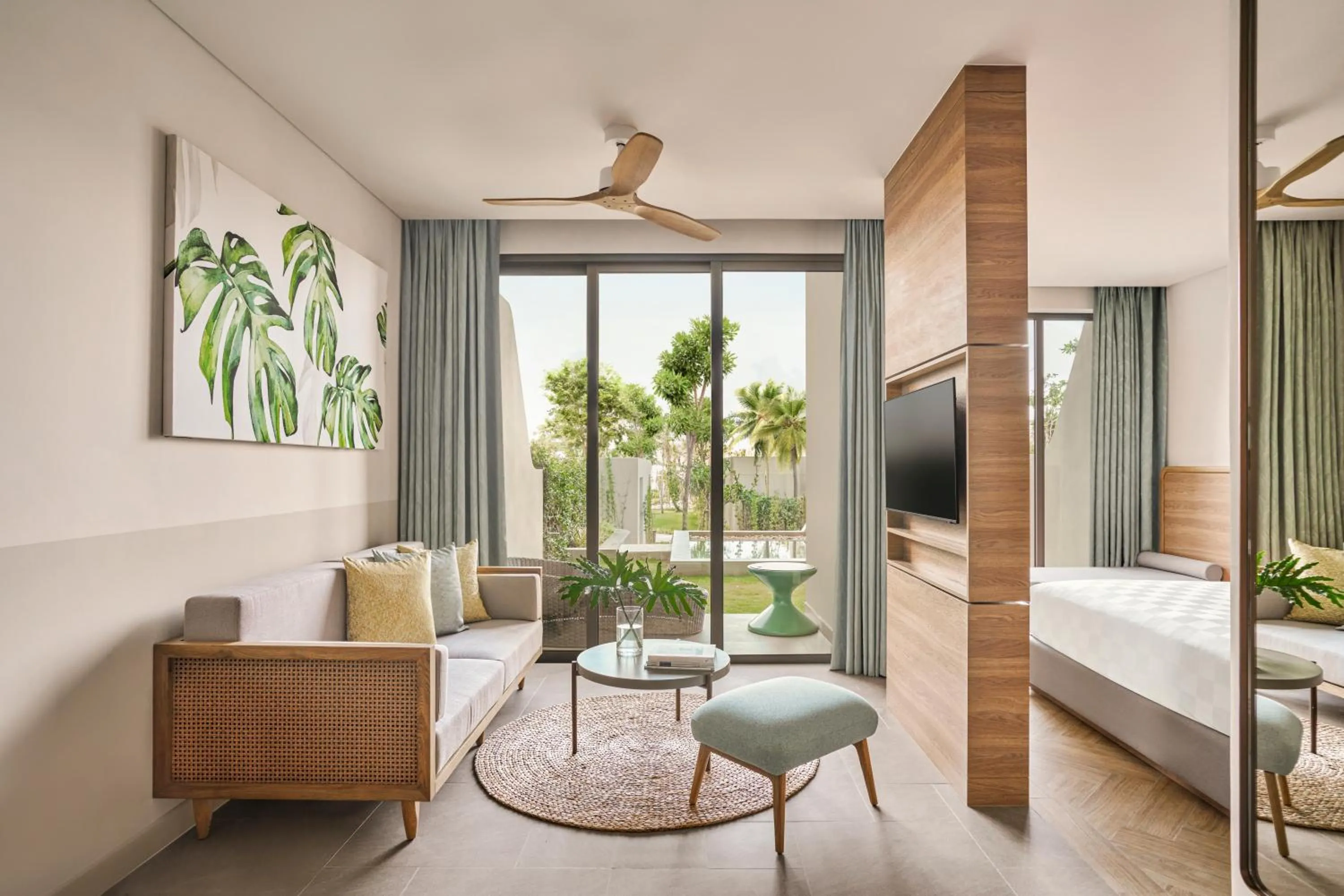 Communal lounge/ TV room, Bed in IXORA Ho Tram By Fusion