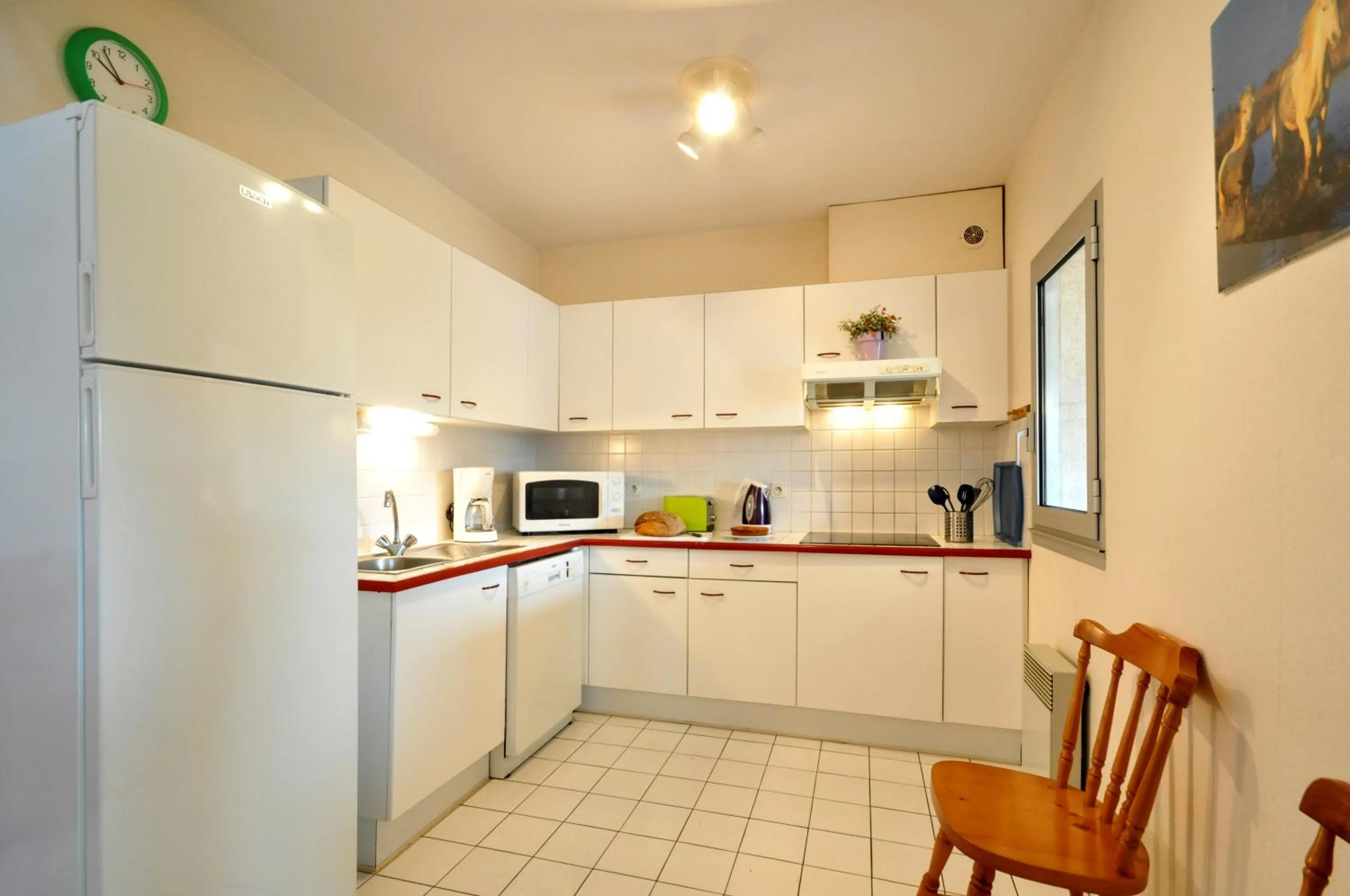 Kitchen or kitchenette in Résidence d'Aquitaine